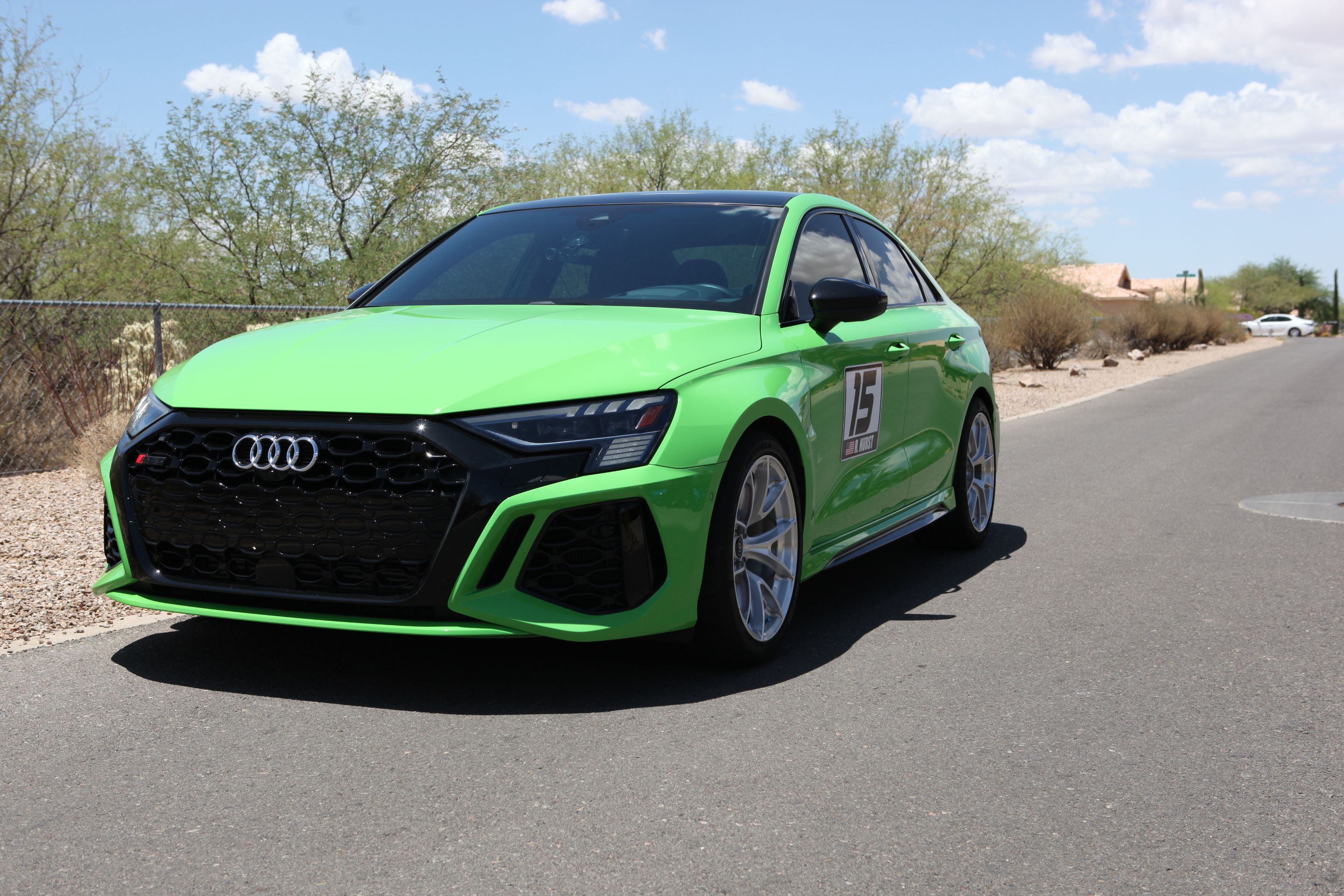 Green Audi 8Y RS 3 with 18" VS-5RS Apex wheels in Brushed Clear