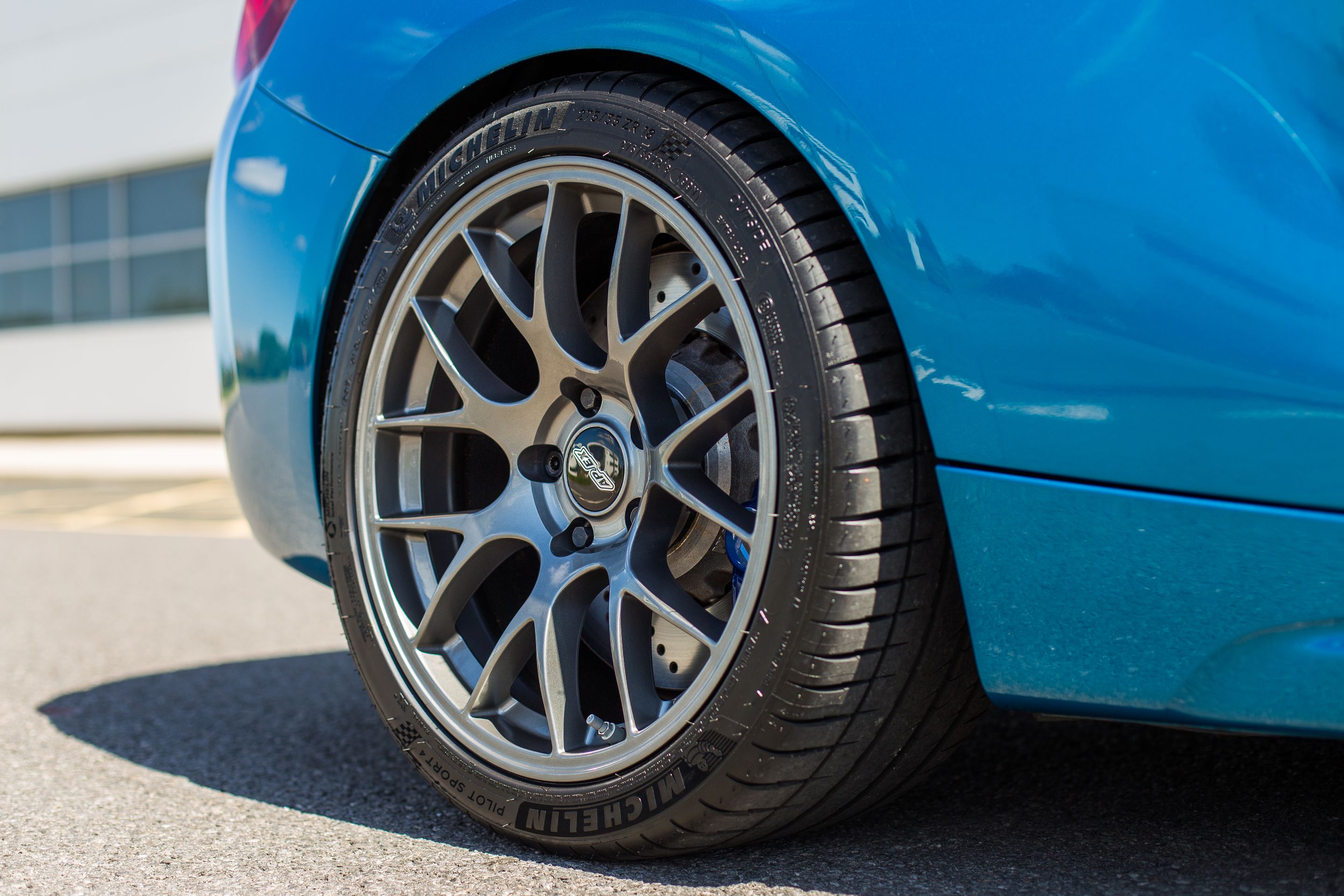 Blue BMW F87 M2 with 18" EC-7 Apex wheels in Anthracite
