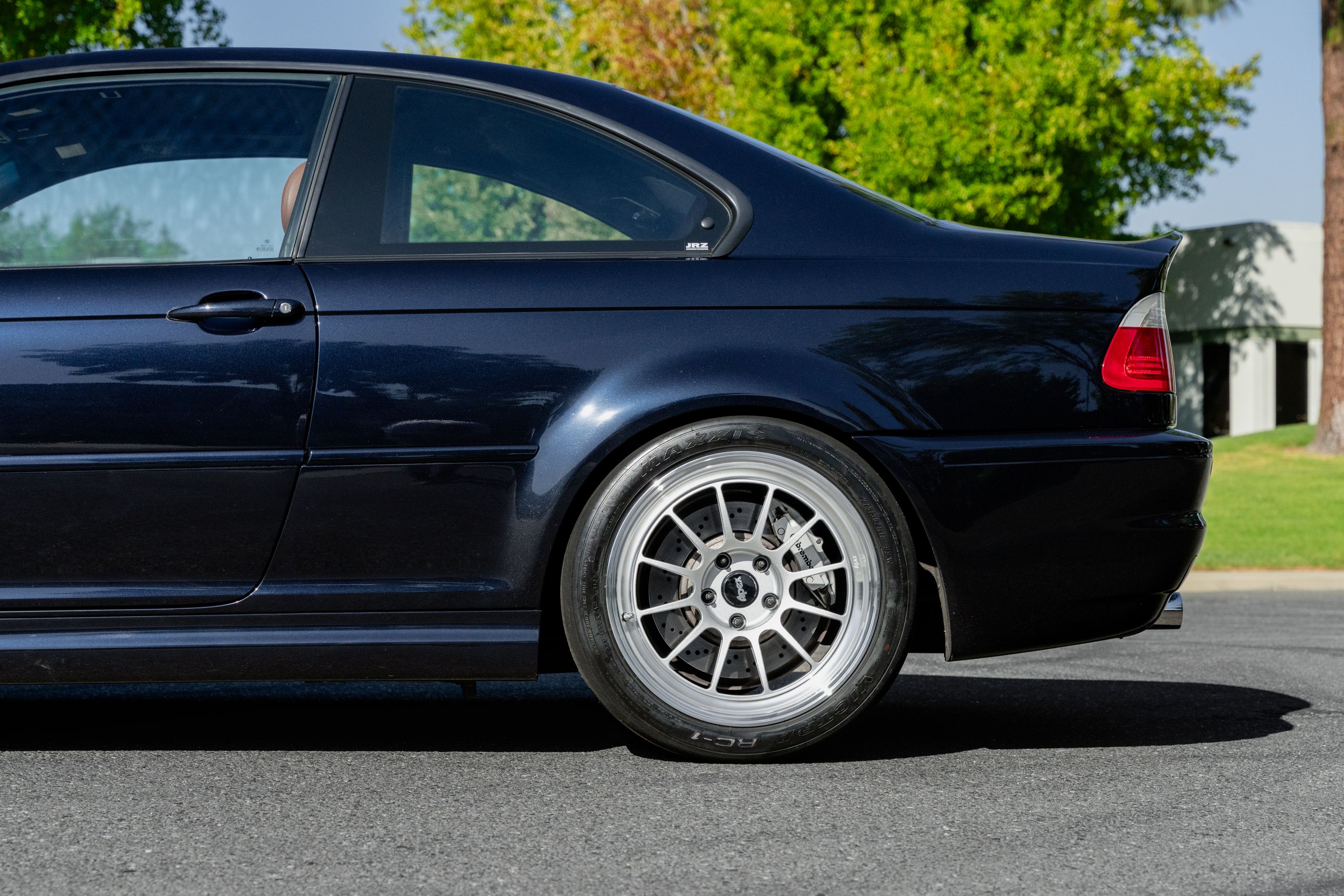 Black BMW E46 M3 with 18" SL-12 Apex wheels in Machined Lip Race Silver