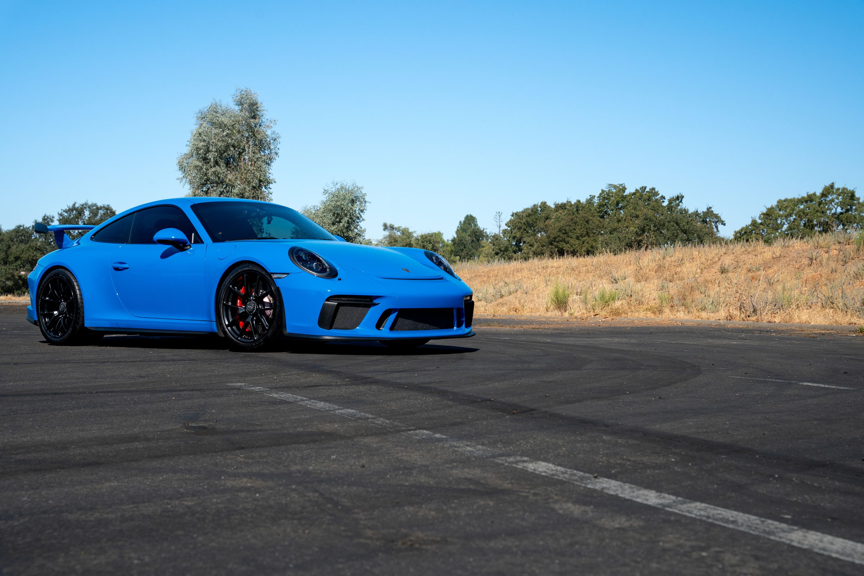Blue Porsche 911 991.2 GT3 with 19" VS-5RE Apex wheels in Satin Black