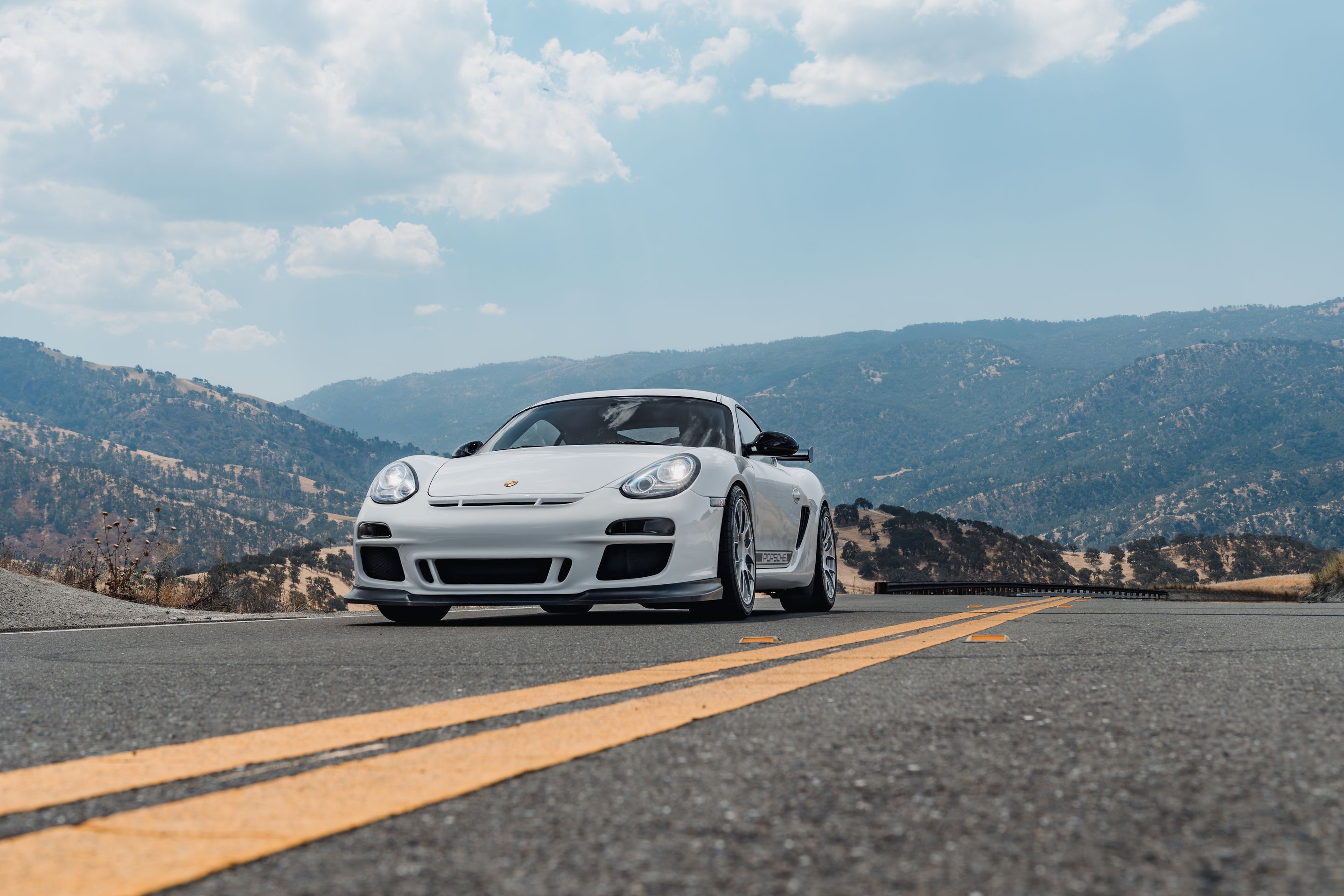 White Porsche 987 Cayman R with 18" EC-7RS Apex wheels in Race Silver