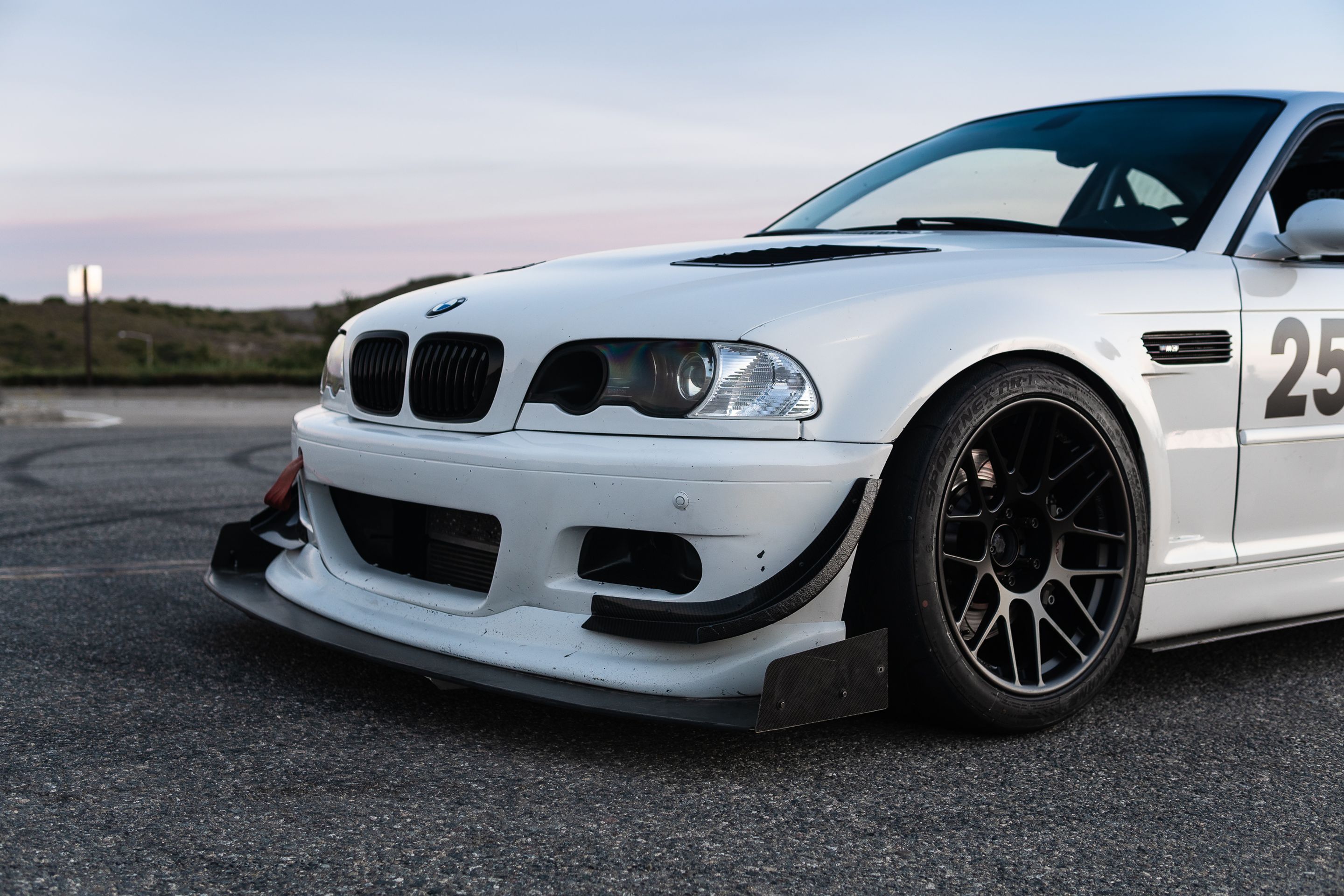 White BMW E46 M3 with 18" ARC-8R Apex wheels in Satin Black