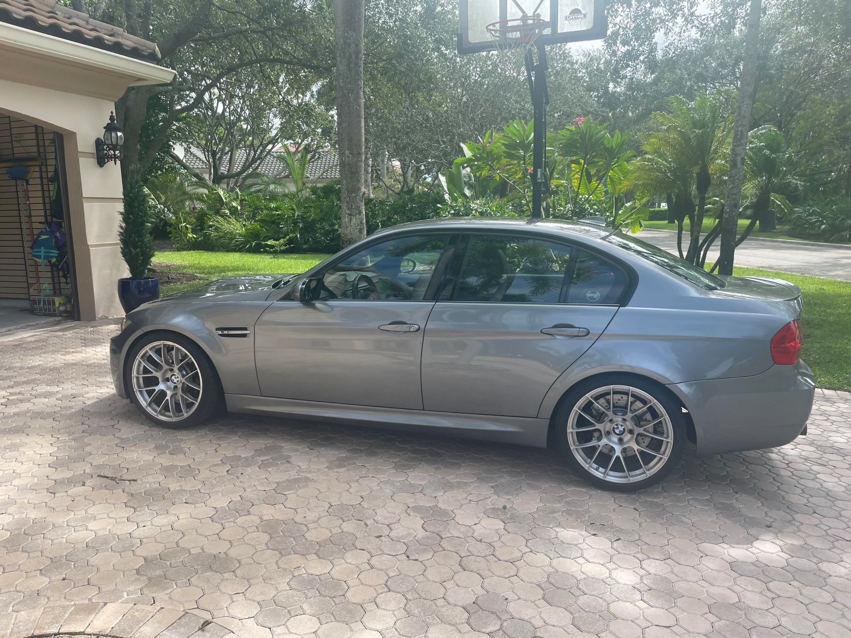 Grey BMW E90 Sedan M3 with 19" EC-7RS Apex wheels in Brushed Clear