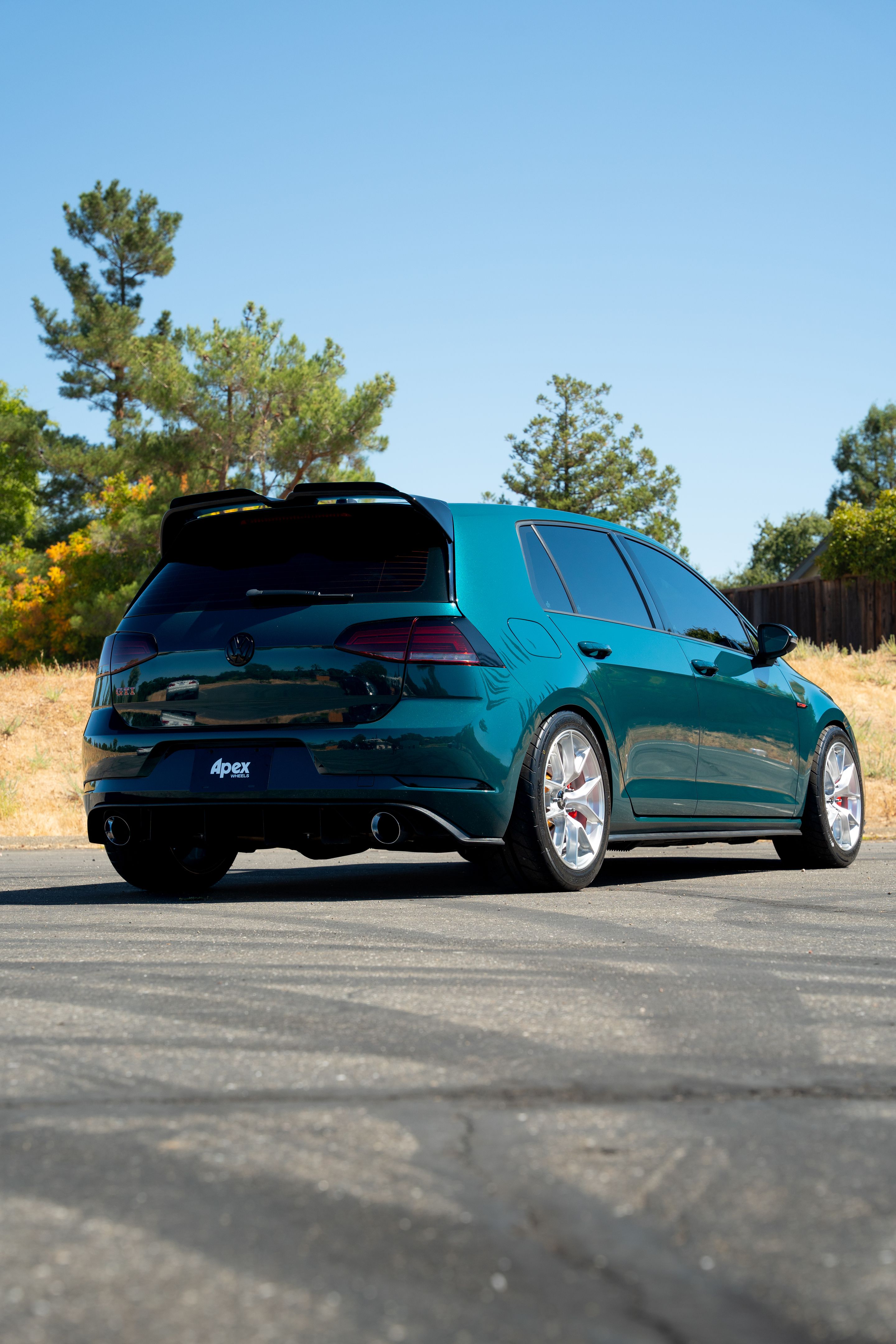 Green VW MK7 GTI with 17" VS-5RS Apex wheels in Brushed Clear