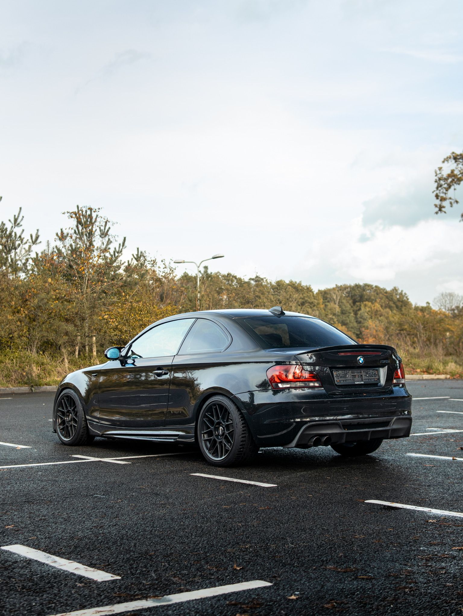 Black BMW E82 Coupe 1 Series with 18" ARC-8 Apex wheels in Satin Black