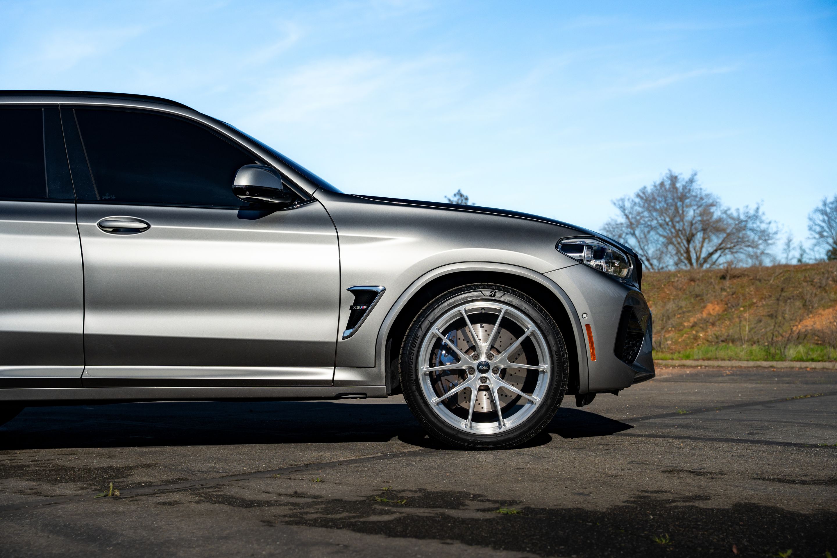 Silver BMW F97 X3M with 21" VS-5RX Apex wheels in Brushed Clear