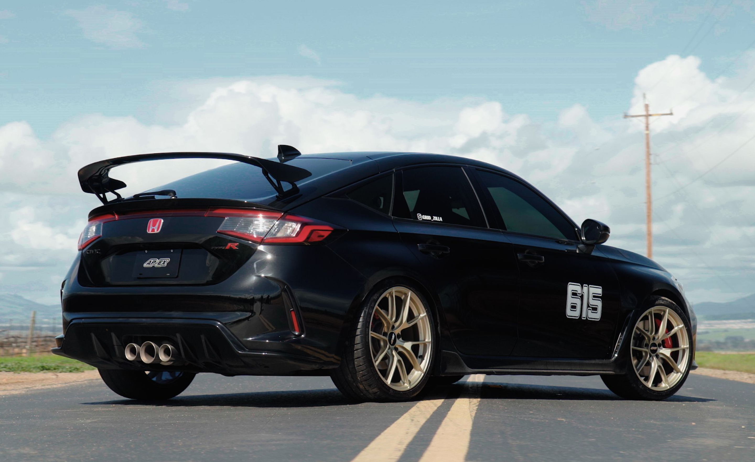 Black Honda FL5 Civic Type-R with 19" VS-5RS Apex wheels in Motorsport Gold