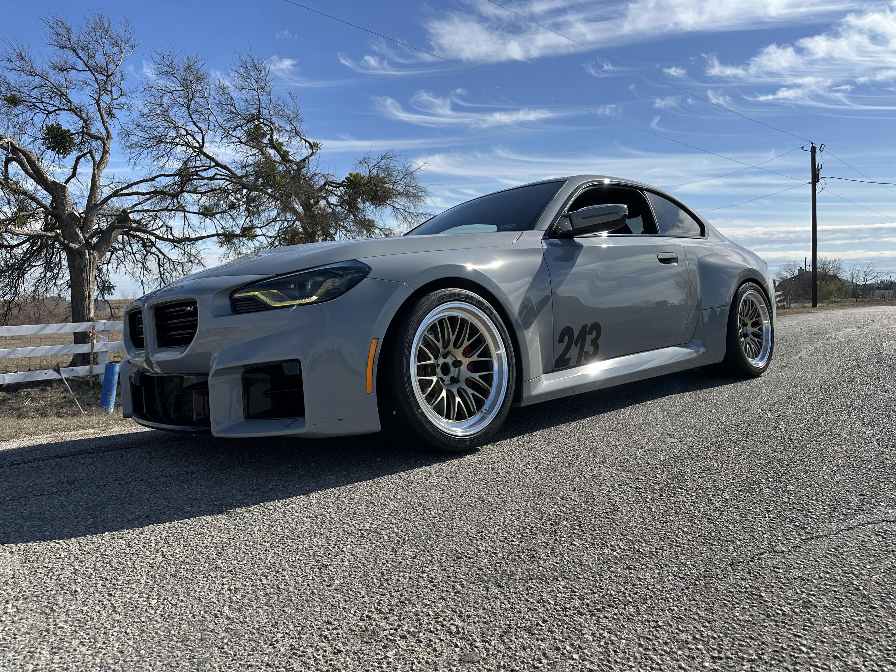 Grey BMW G87 M2 with 19" ML-10RT Apex wheels in Machined Lip Gloss Motorsport Gold