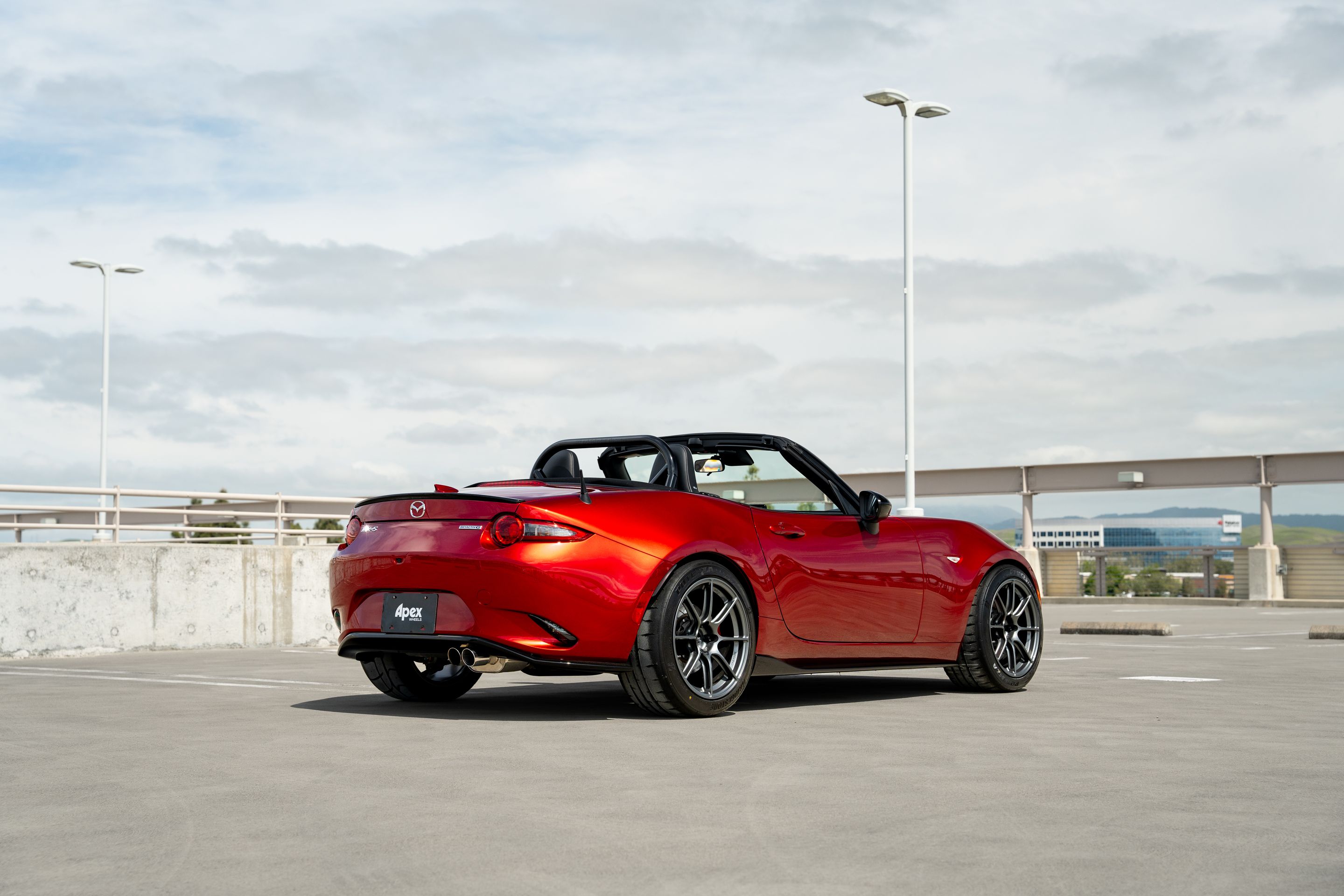 Red Mazda ND MX-5 Miata with 17" SM-8RS Apex wheels in Anthracite