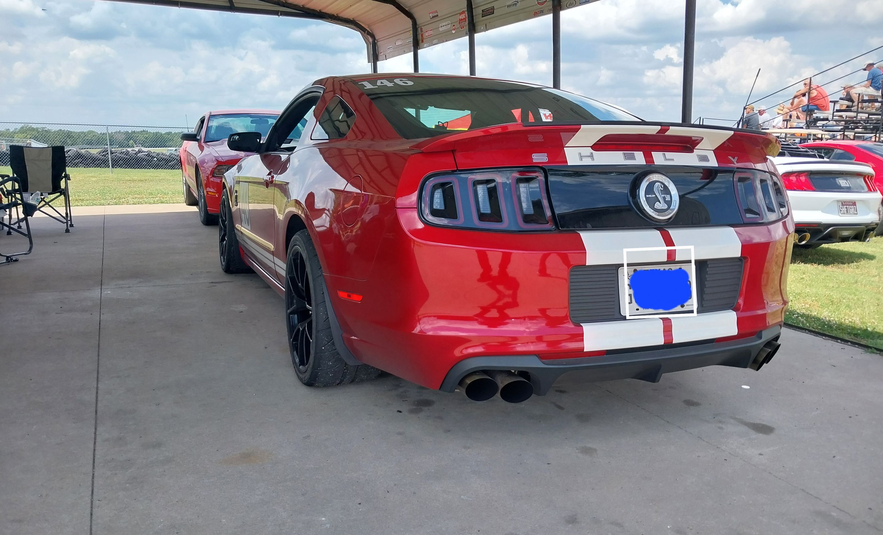 Red Ford S197 Mustang GT500 with 19" VS-5RE Apex wheels in Satin Black