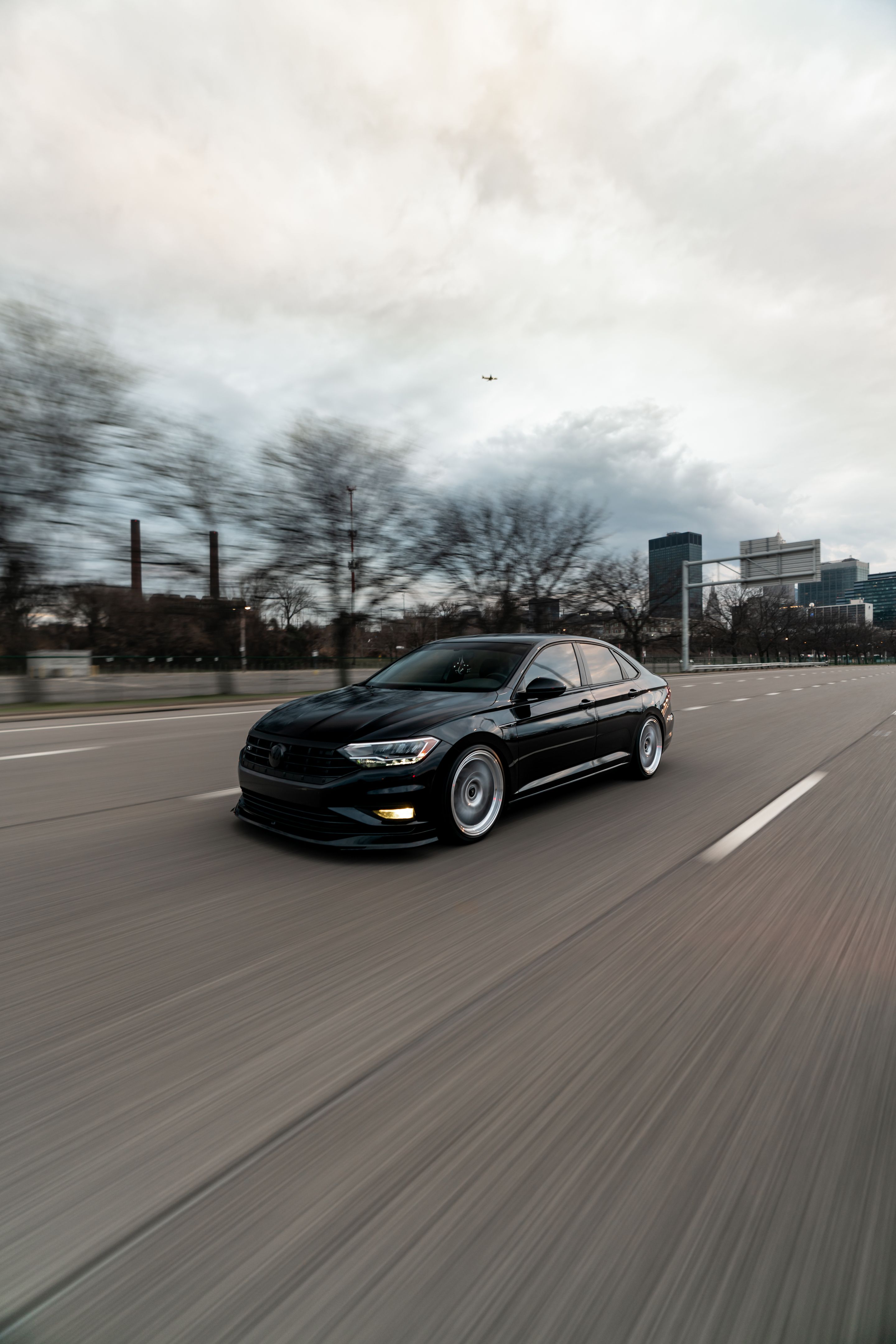 Black VW MK7 Jetta with 19" ML-10RT Apex wheels in Machined Lip Race Silver