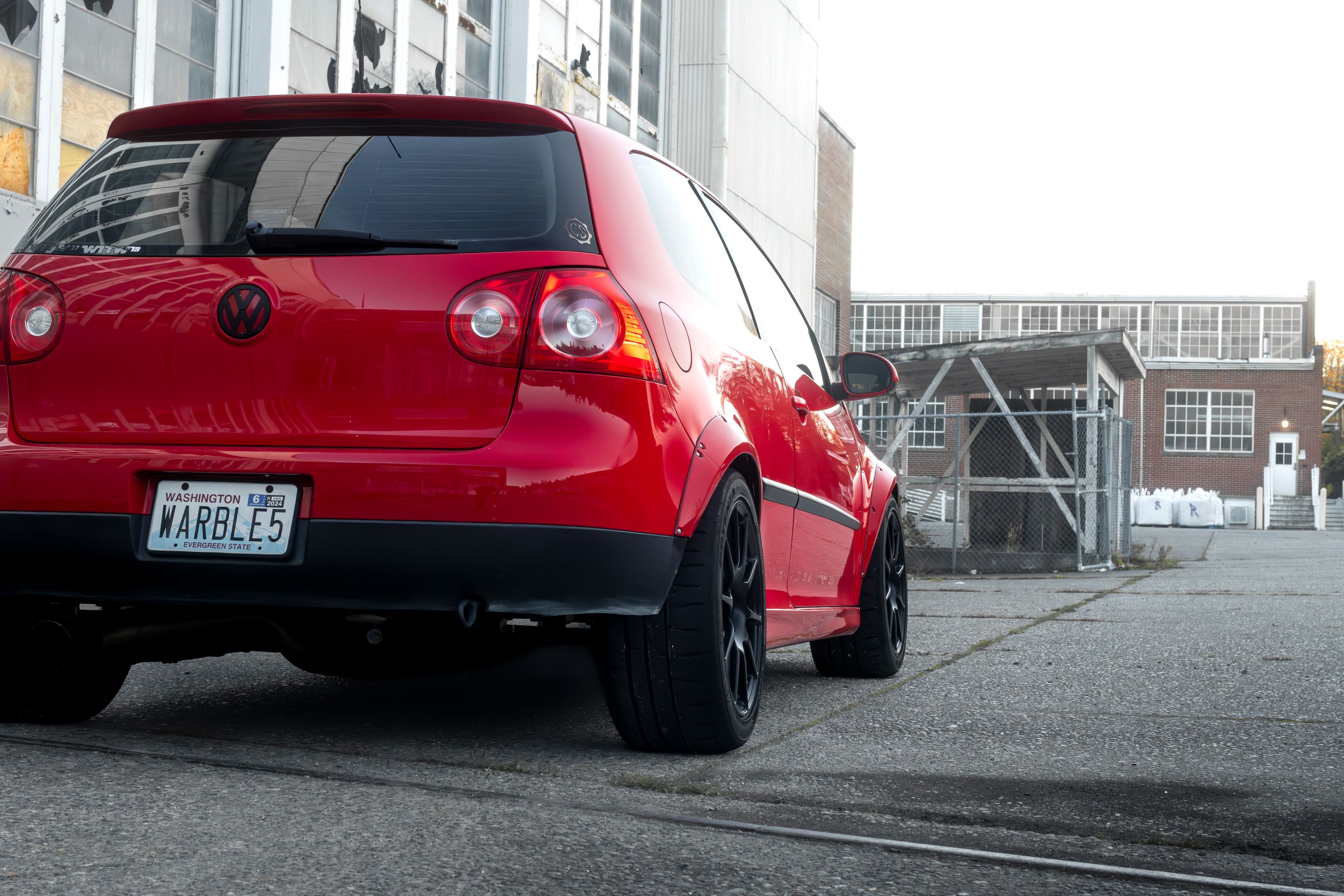 Red VW MK5 Golf with 17" SM-10 Apex wheels in Satin Black