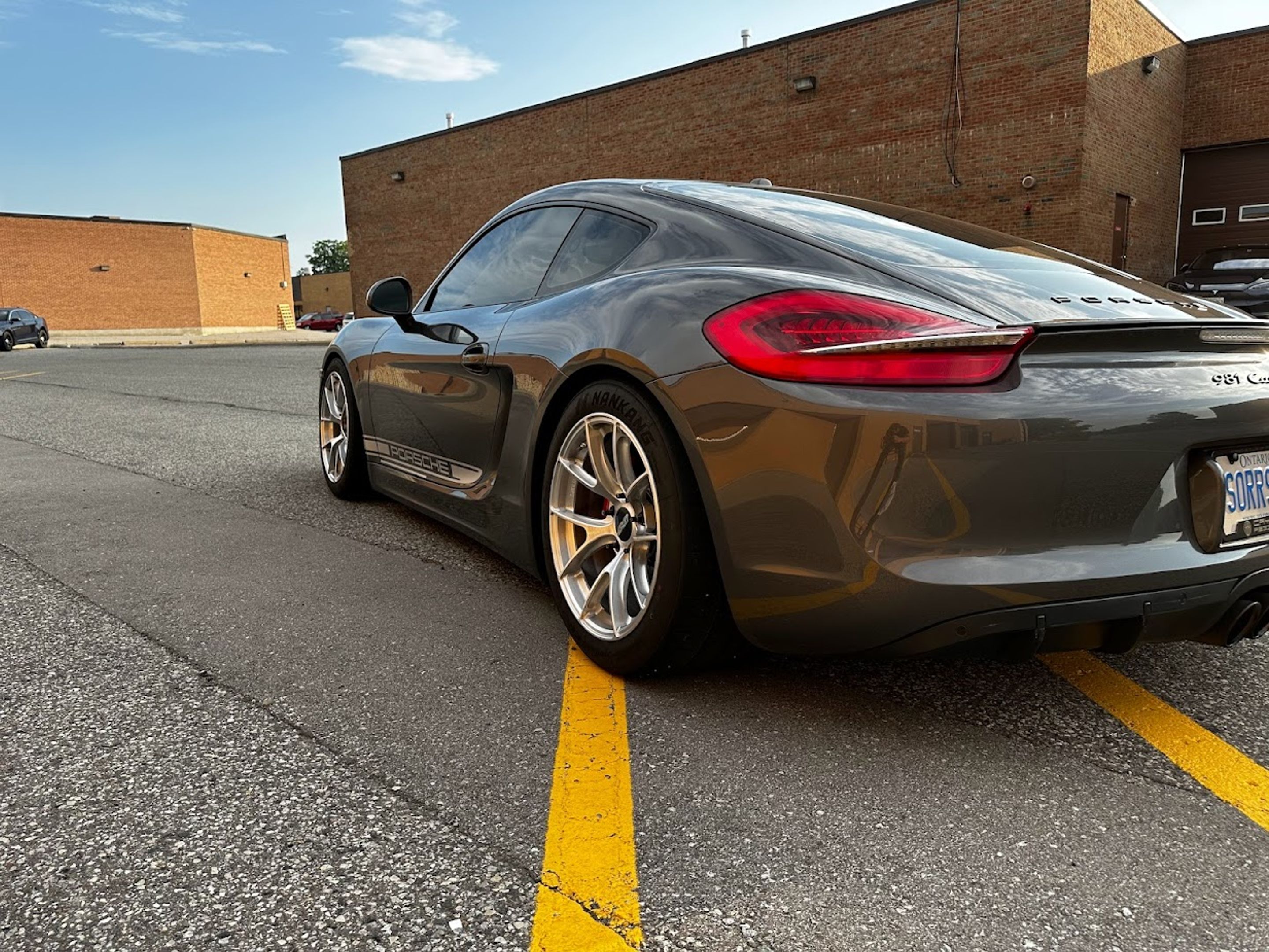 Grey Porsche 981 Cayman S with 18" VS-5RS Apex wheels in Brushed Clear