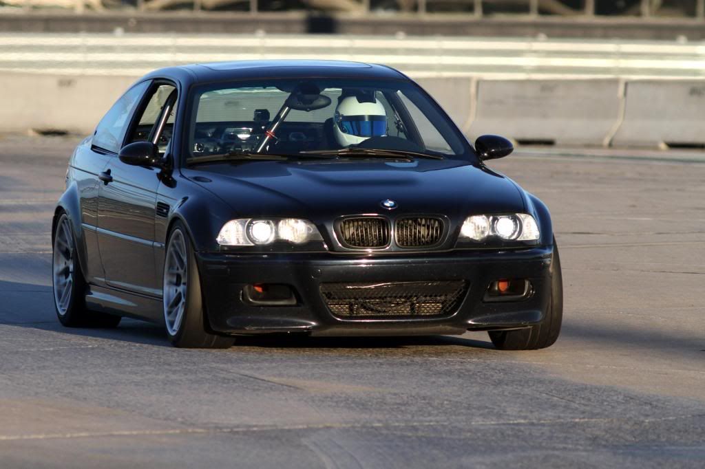 Black BMW E46 M3 with 18" ARC-8 Apex wheels in Hyper Silver
