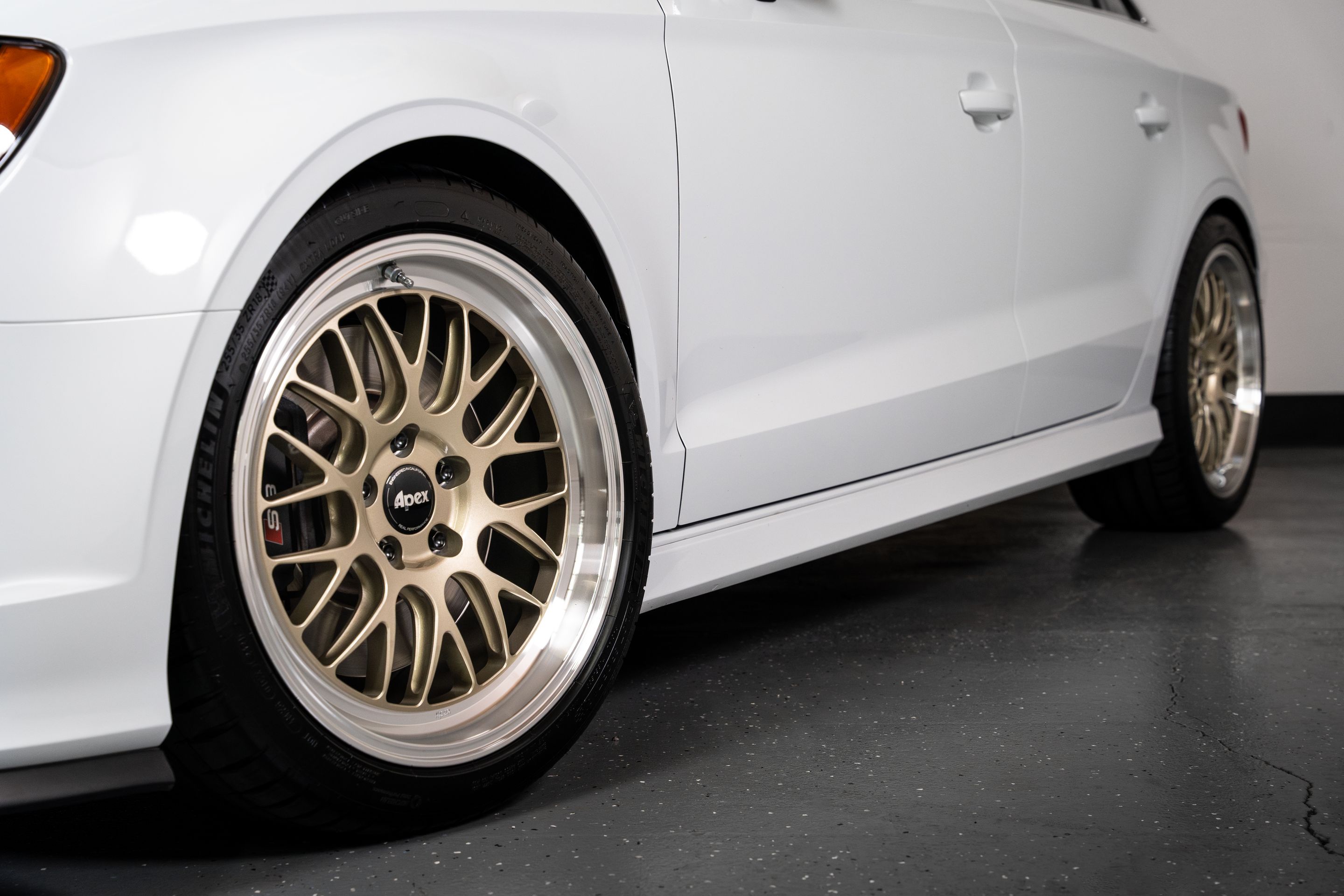 White Audi 8V S3 with 18" ML-10RT Apex wheels in Machined Lip Gloss Motorsport Gold