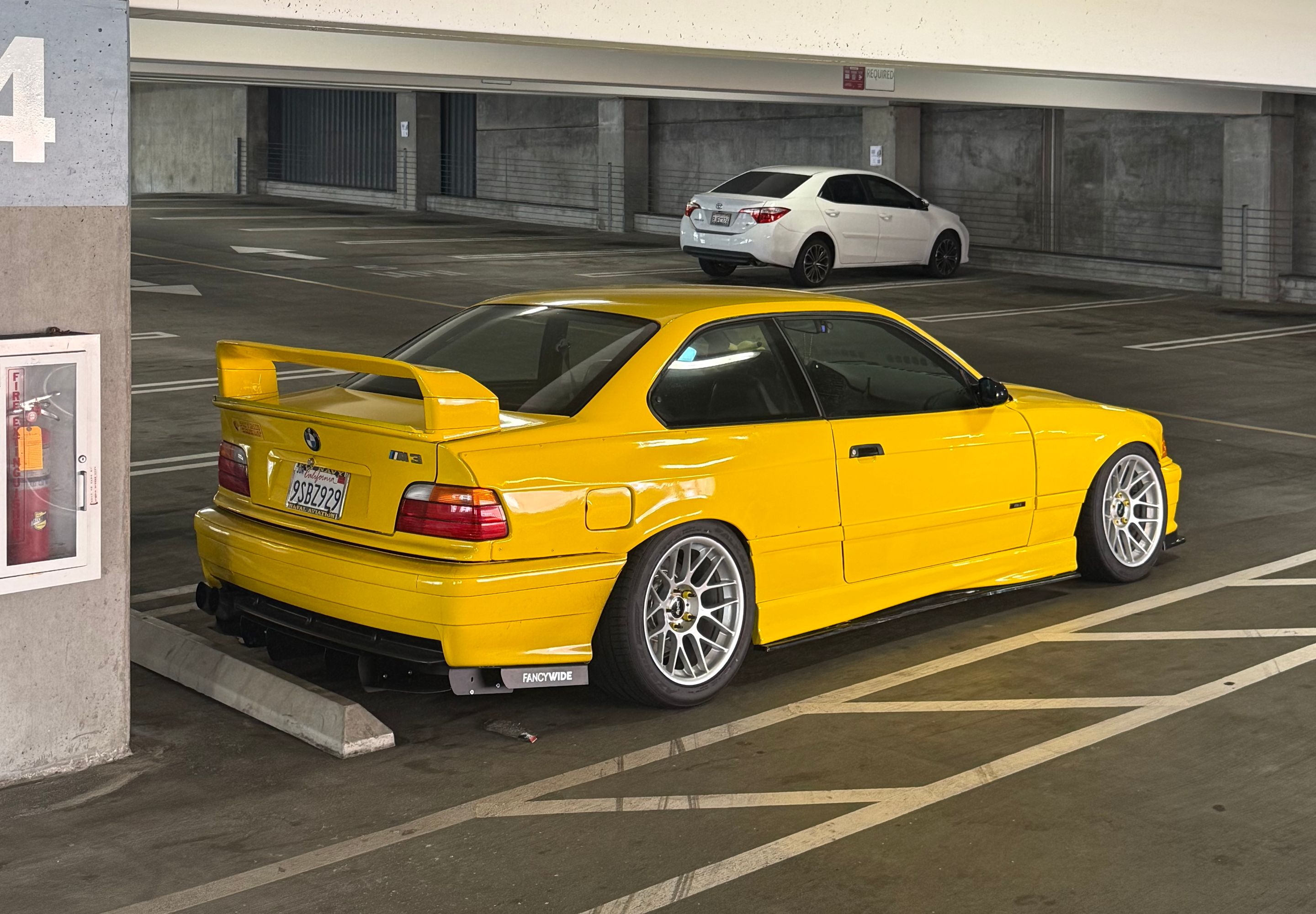Yellow BMW E36 M3 with 17" ARC-8 Apex wheels in Race Silver
