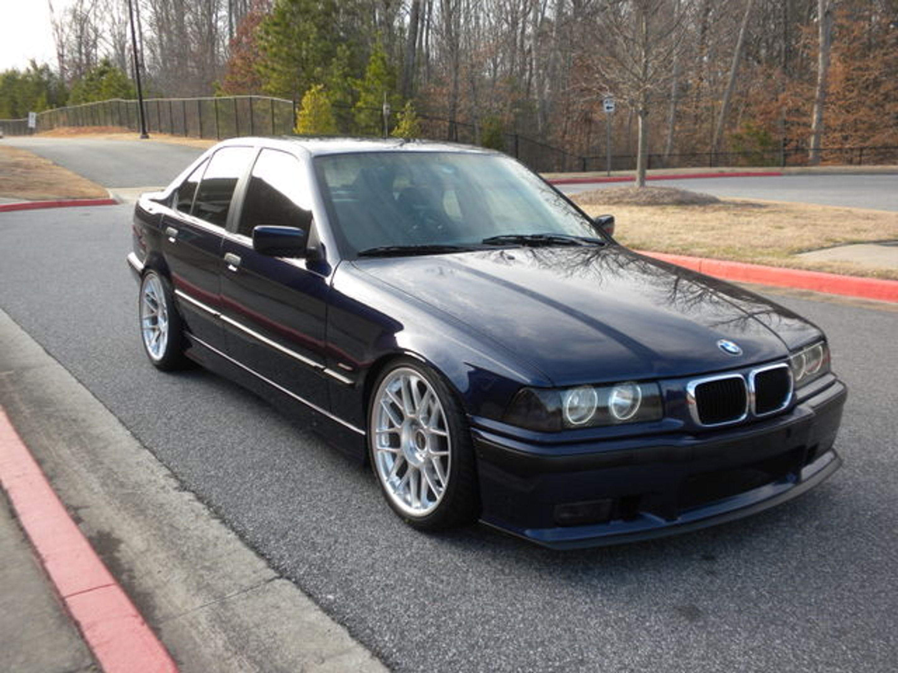 Blue BMW E36 3 Series with 18" ARC-8 Apex wheels in Hyper Silver