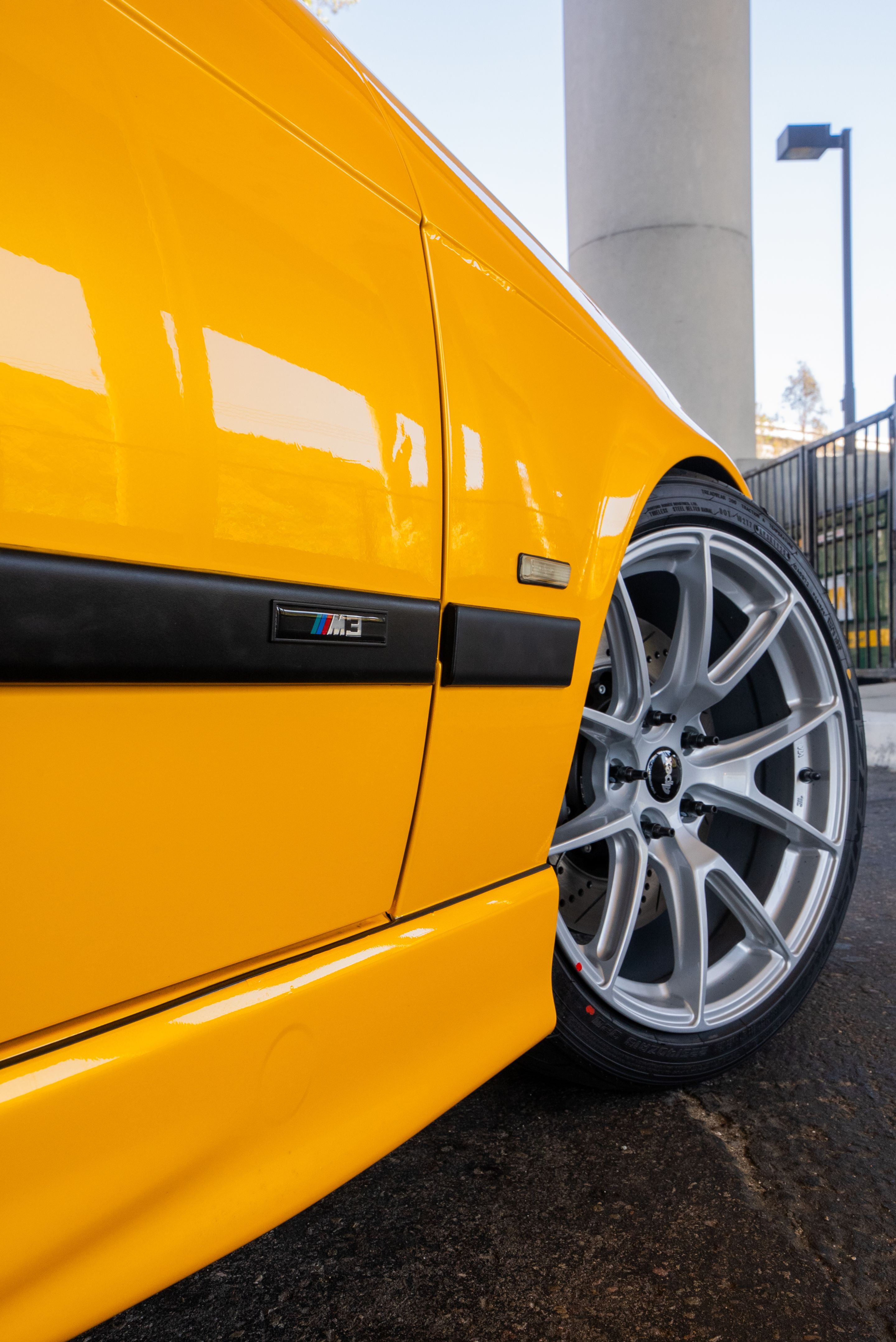 Yellow BMW E36 M3 with 18" VS-5 Apex wheels in Race Silver