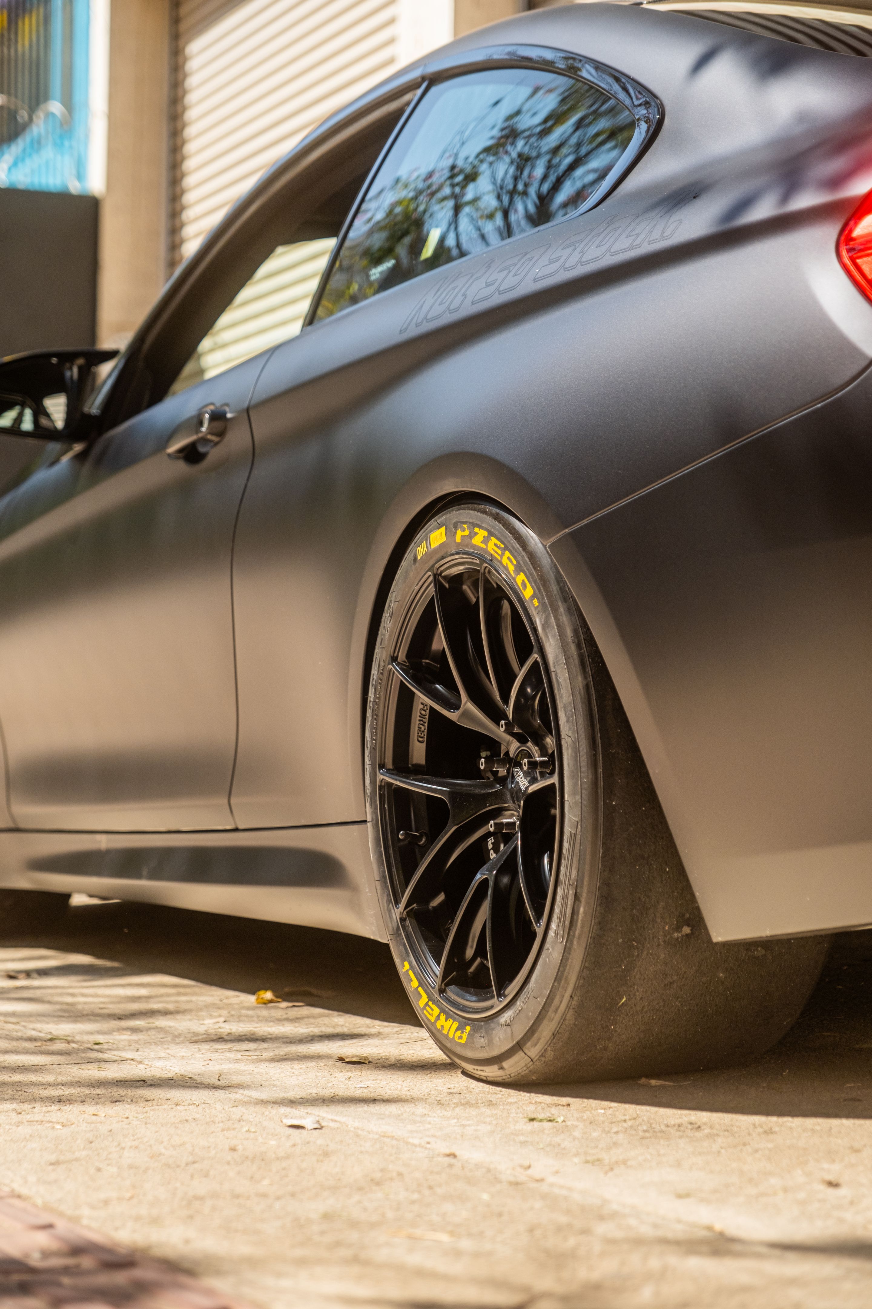 Black BMW F82 Coupe M4 with 18" VS-5RS Apex wheels in Satin Black