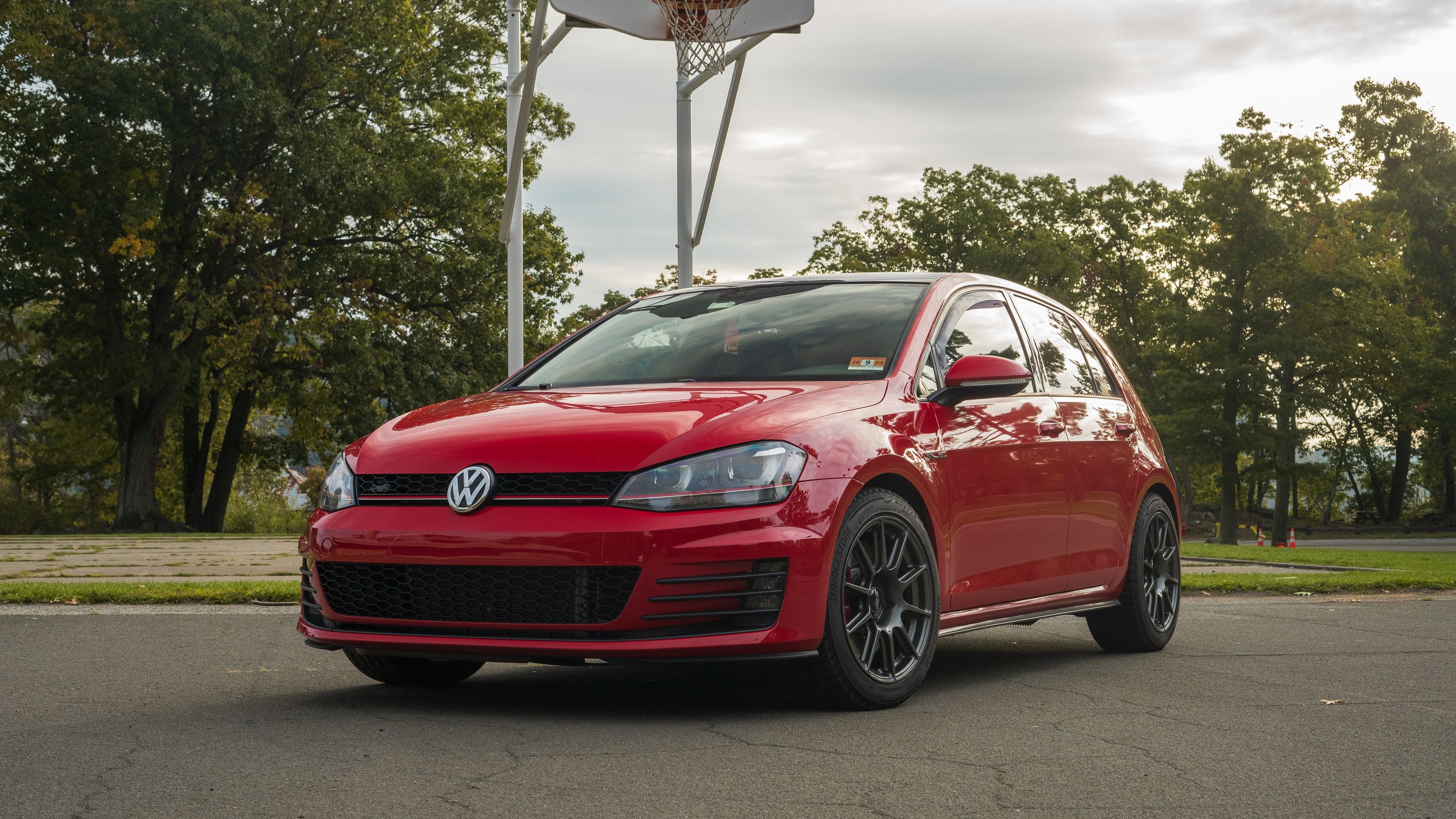 Red VW MK7 GTI with 17" SM-10 Apex wheels in Anthracite
