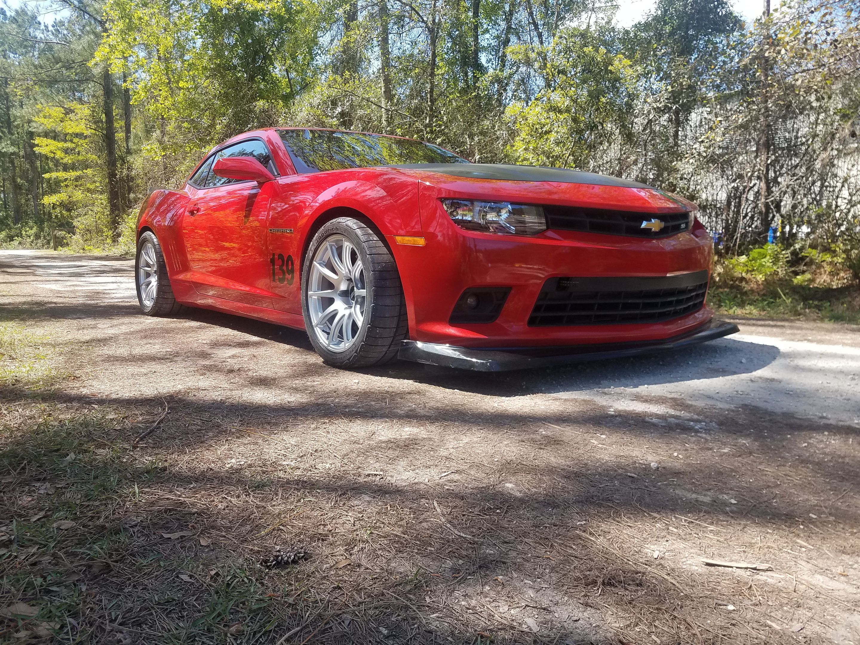 Red Chevrolet 5th Gen Camaro SS 1LE with 18" SM-10 Apex wheels in Race Silver
