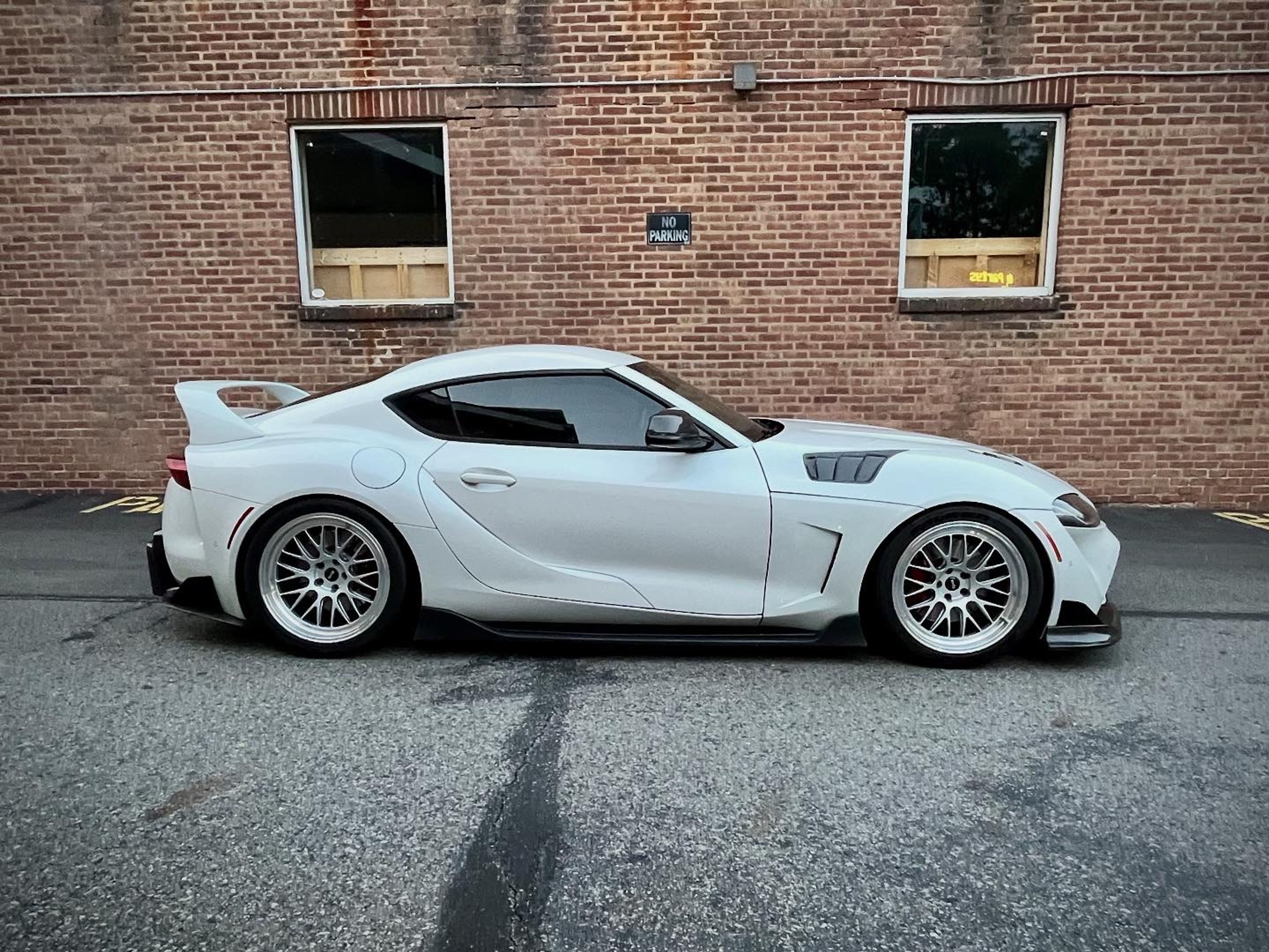 White Toyota GR Supra with 19" ML-10RT Apex wheels in Machined Lip Race Silver