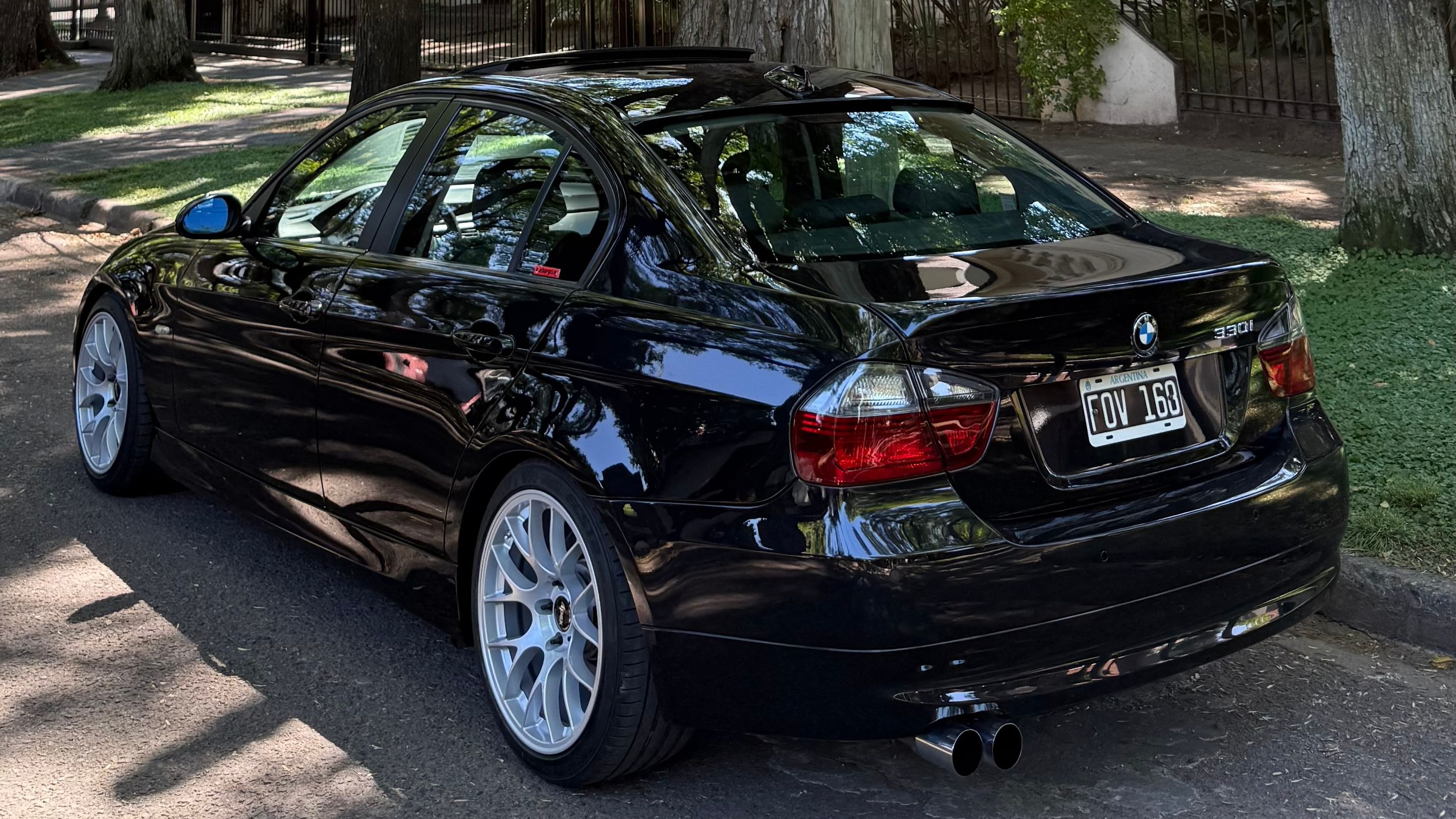 Black BMW E90 Sedan 3 Series with 18" EC-7 Apex wheels in Race Silver