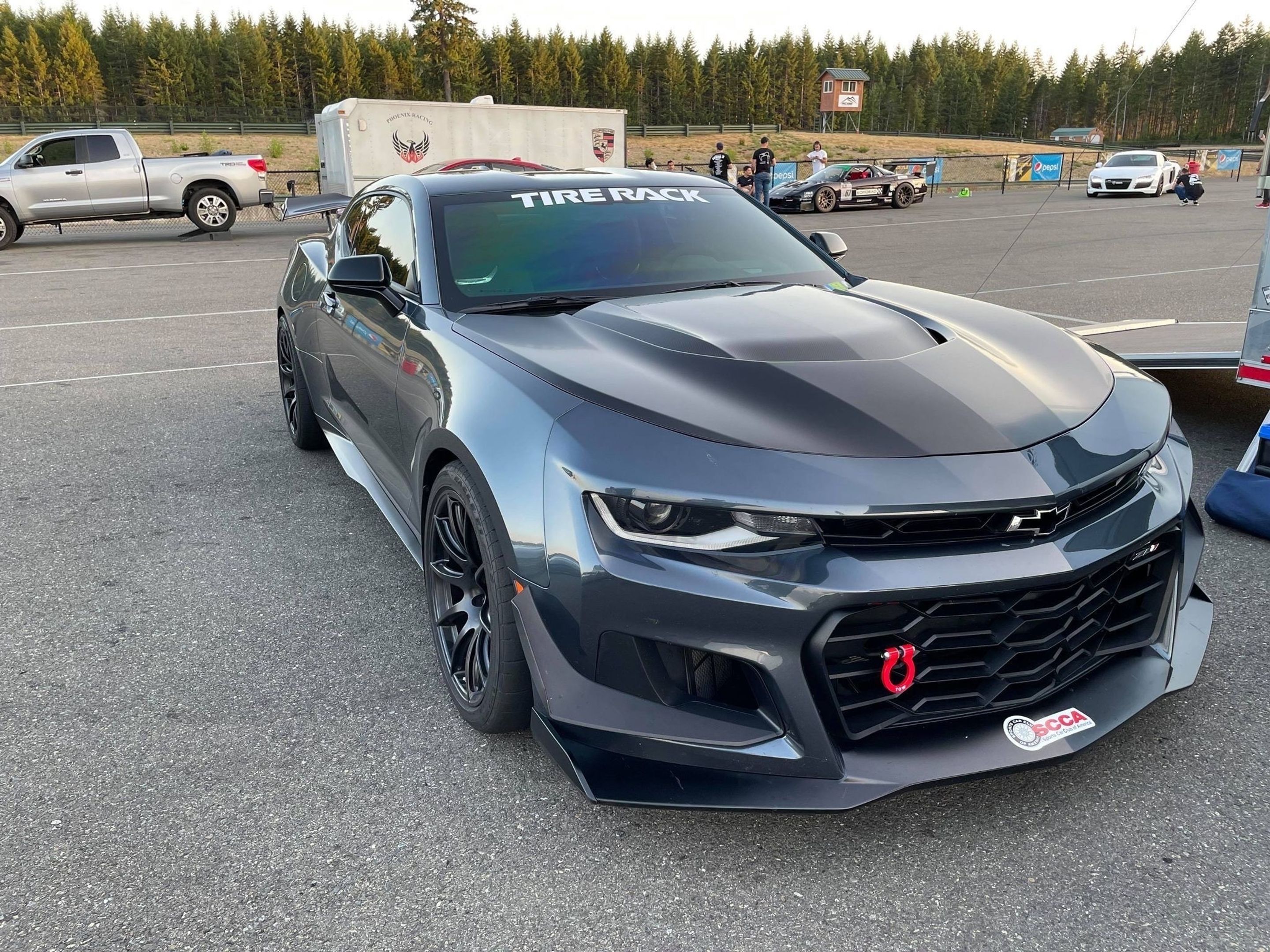 Grey Chevrolet 6th Gen Camaro ZL1 1LE with 19" SM-10 Apex wheels in Satin Black