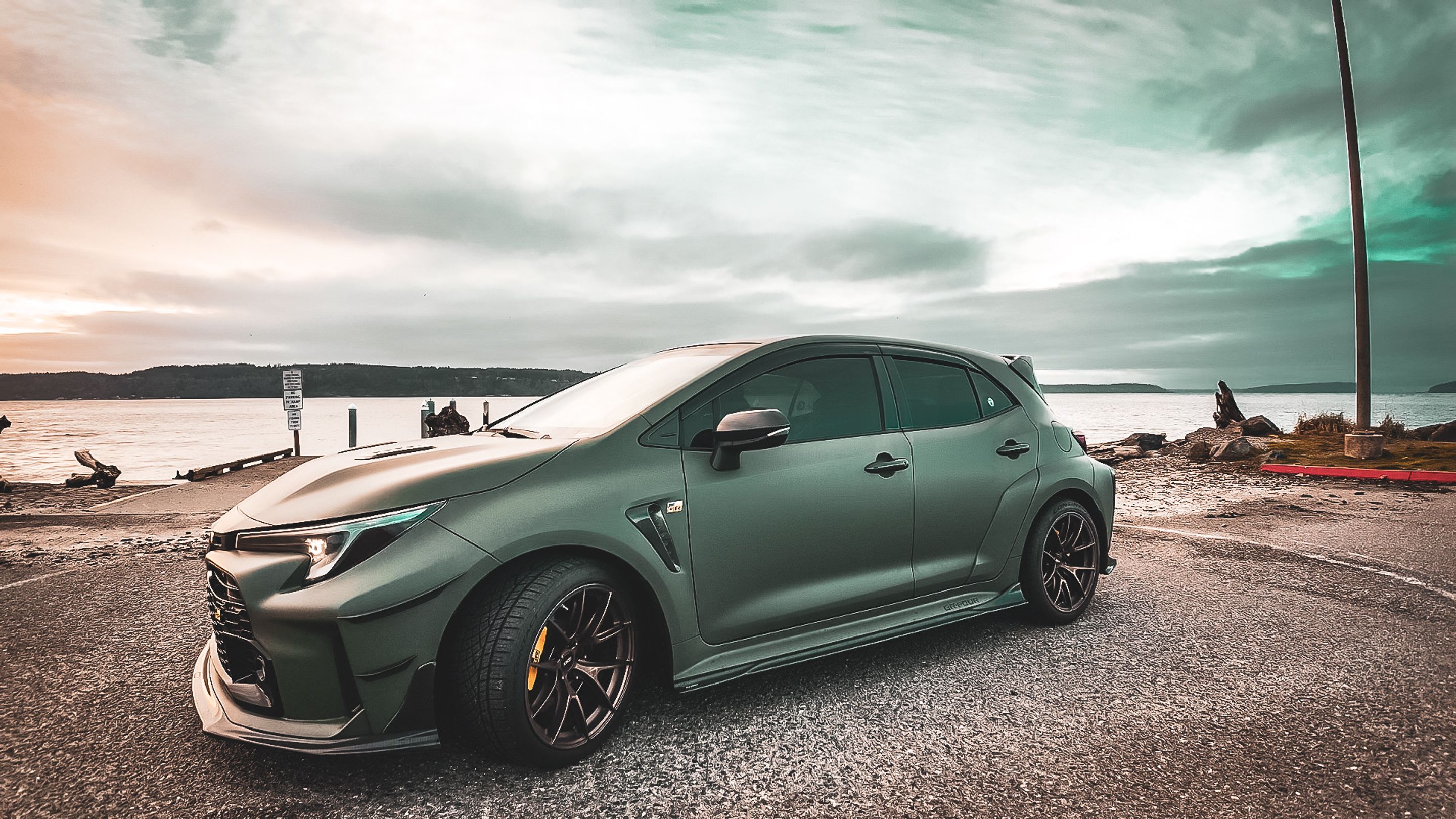Green Toyota GR Corolla with 18" VS-5RS Apex wheels in Satin Bronze