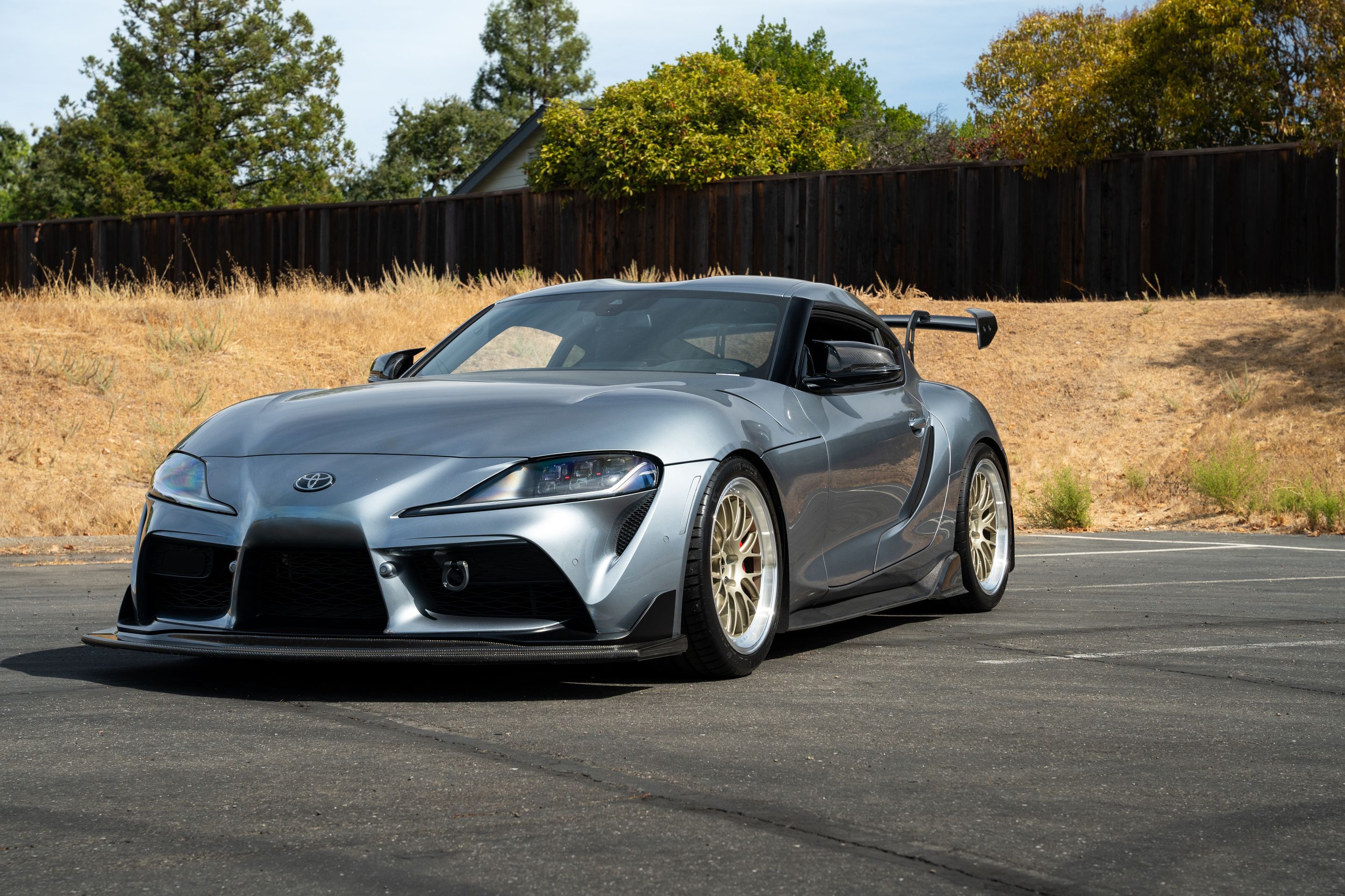 Grey Toyota GR Supra with 19" ML-10RT Apex wheels in Machined Lip Gloss Motorsport Gold