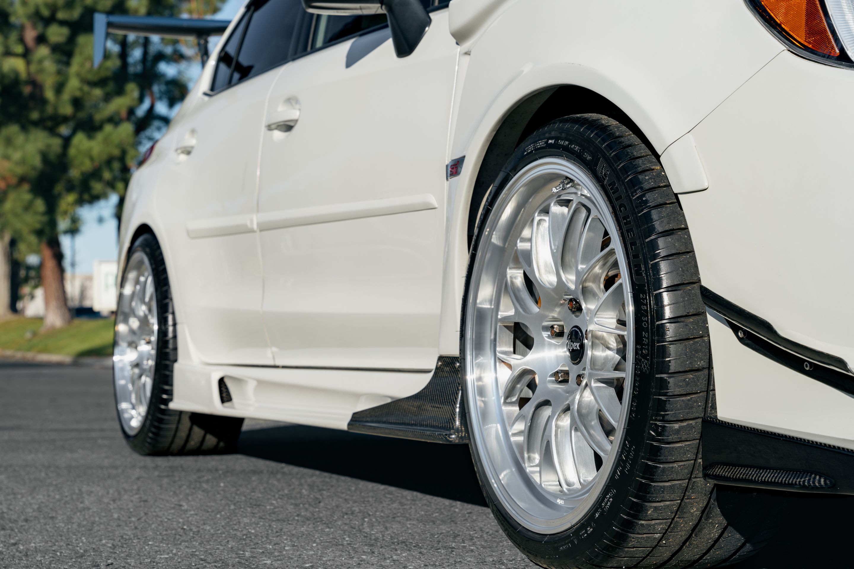 White Subaru VA WRX STI with 19" ML-10RT Apex wheels in Machined Lip Brushed Clear