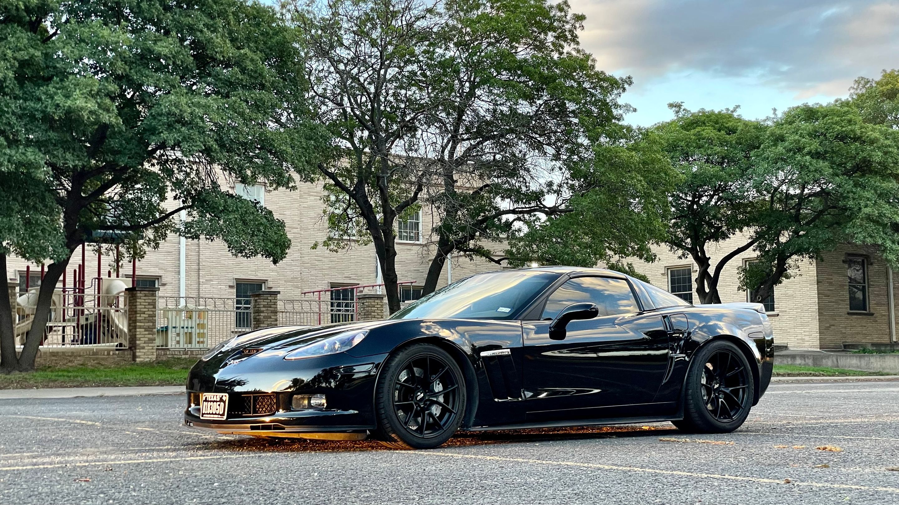 Black Chevrolet C6 Corvette Grand Sport with 18"/19" VS-5RS Apex wheels in Satin Black