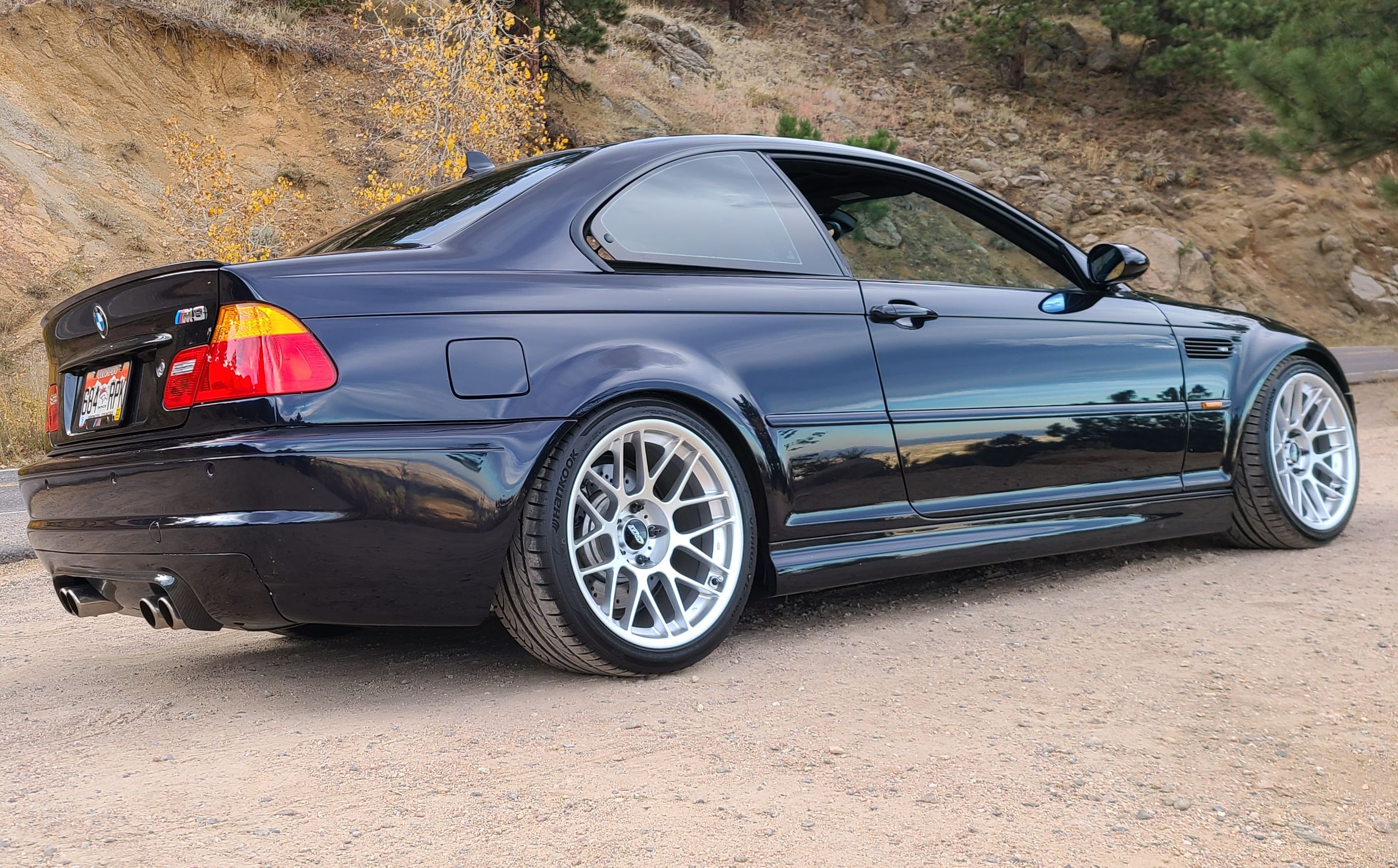 Black BMW E46 M3 with 18" ARC-8 Apex wheels in Hyper Silver