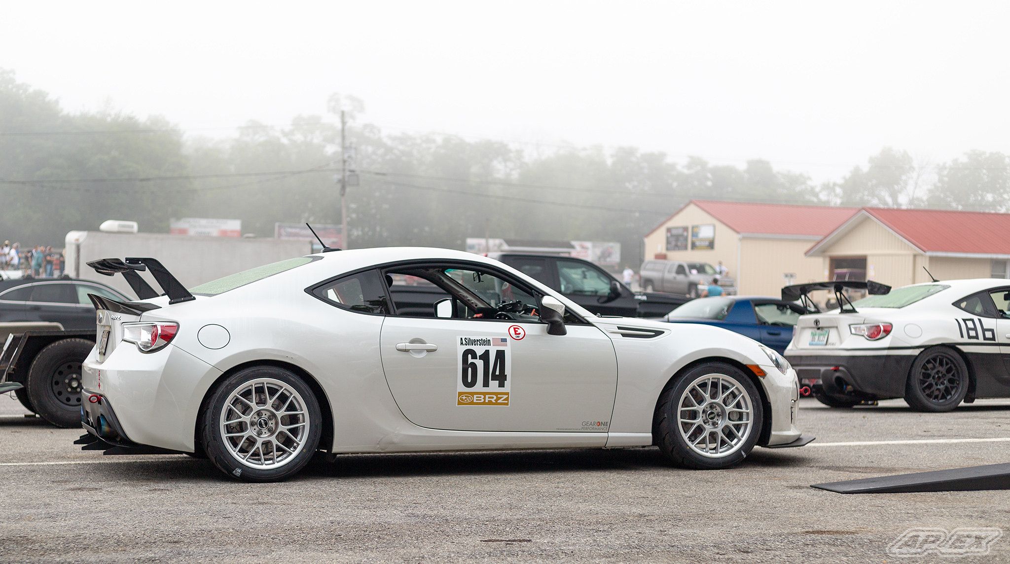 White Subaru ZC6 / Gen 1 BRZ with 17" ARC-8 Apex wheels in Race Silver