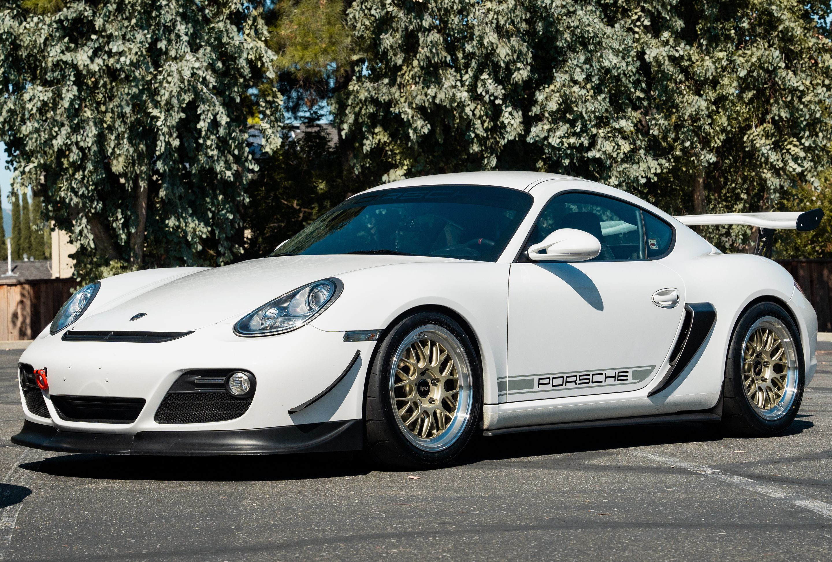 White Porsche 987 Cayman Base with 18" ML-10RT Apex wheels in Machined Lip Gloss Motorsport Gold