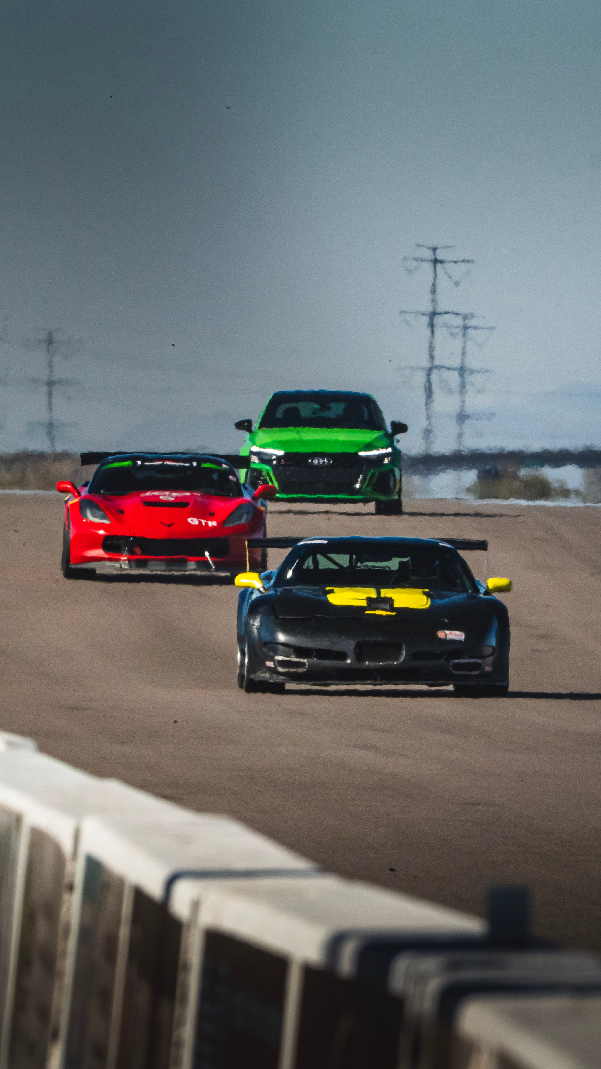 Green Audi 8Y RS 3 with 18" VS-5RS Apex wheels in Brushed Clear