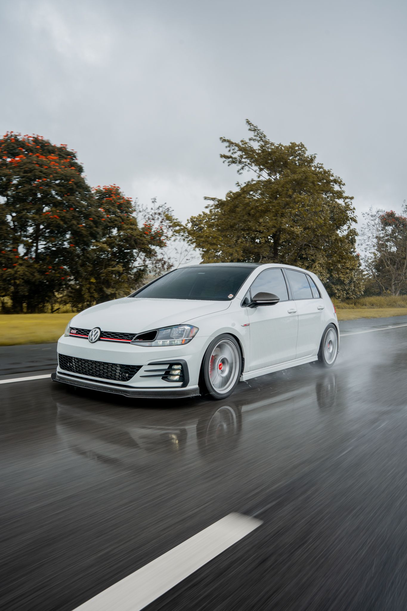 White VW MK7 GTI with 18" SM-10 Apex wheels in Race Silver
