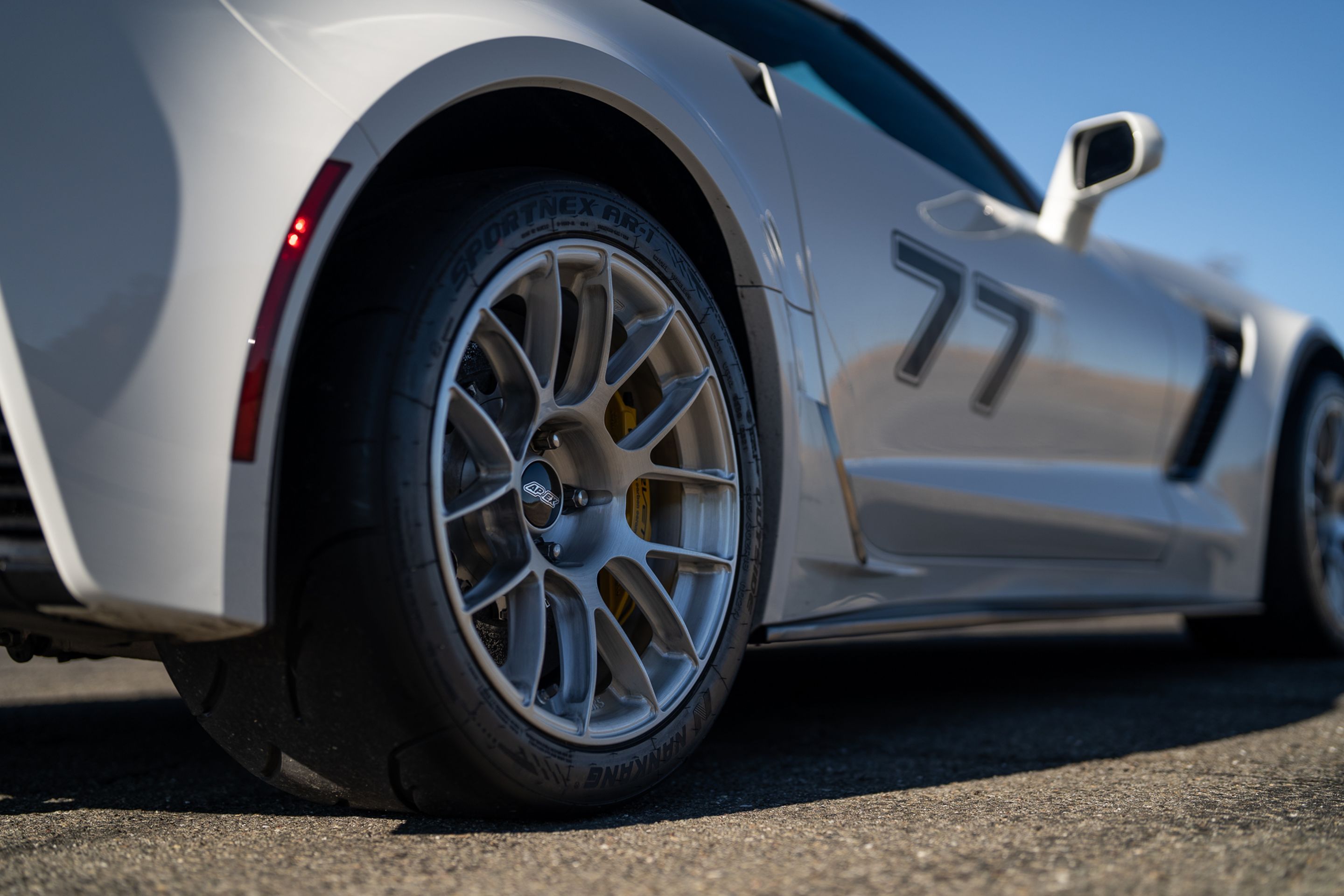 White Chevrolet C7 Corvette Z06 with 18" EC-7RS Apex wheels in Brushed Clear