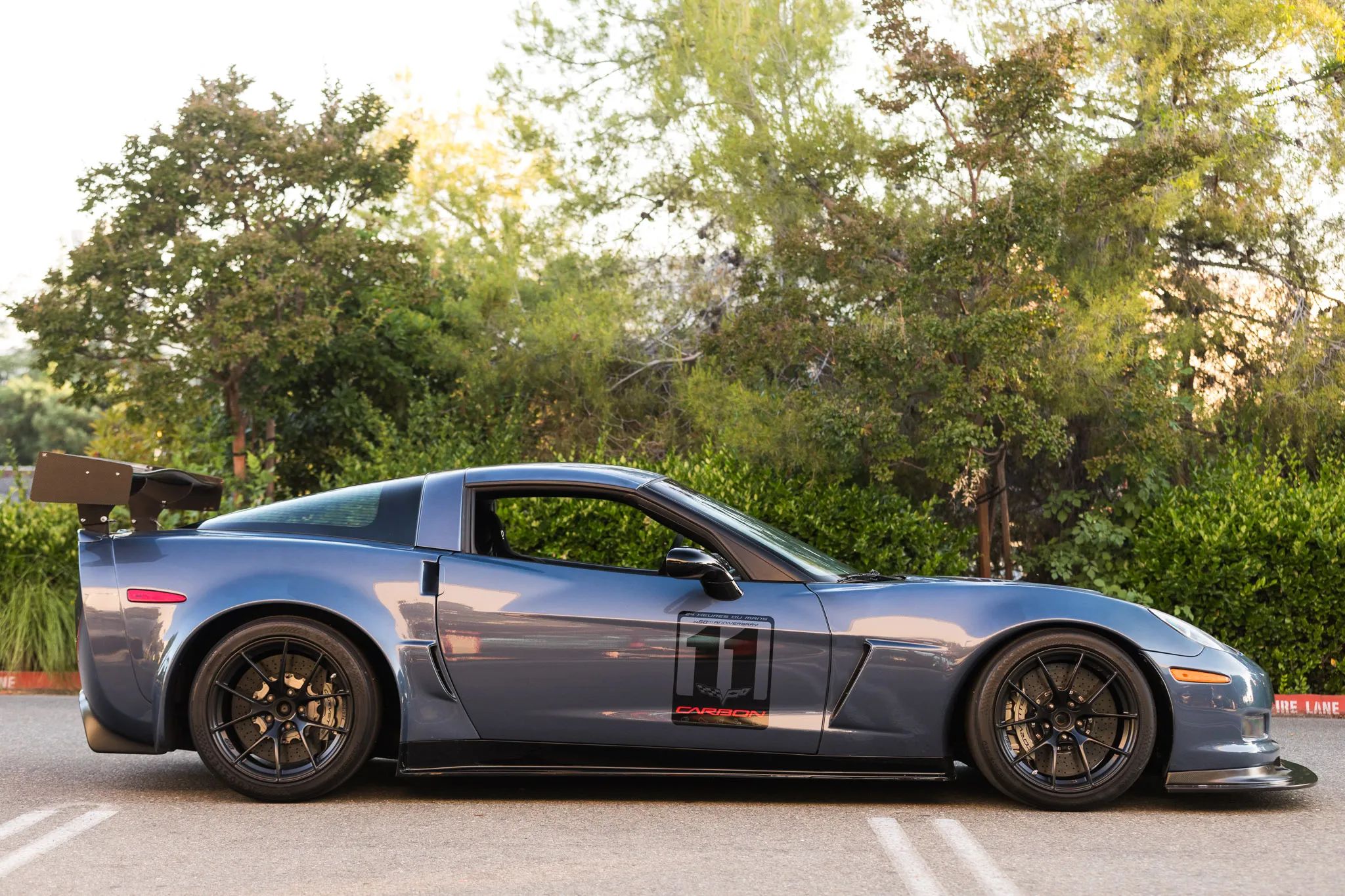 Blue Chevrolet C6 Corvette Z06 with 18" VS-5RS Apex wheels in Satin Black