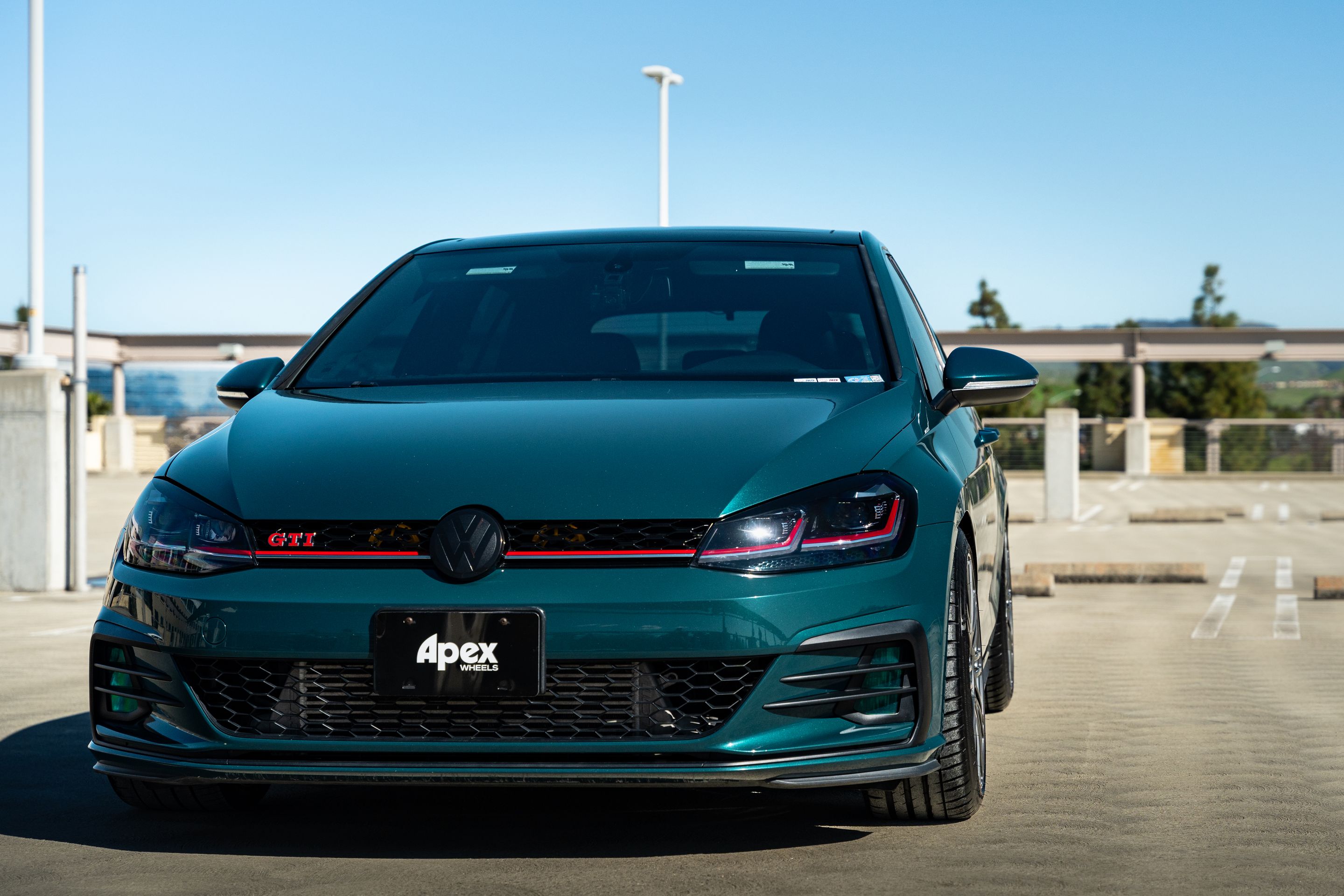 Green VW MK7 GTI with 18" TC-10RT Apex wheels in Anthracite