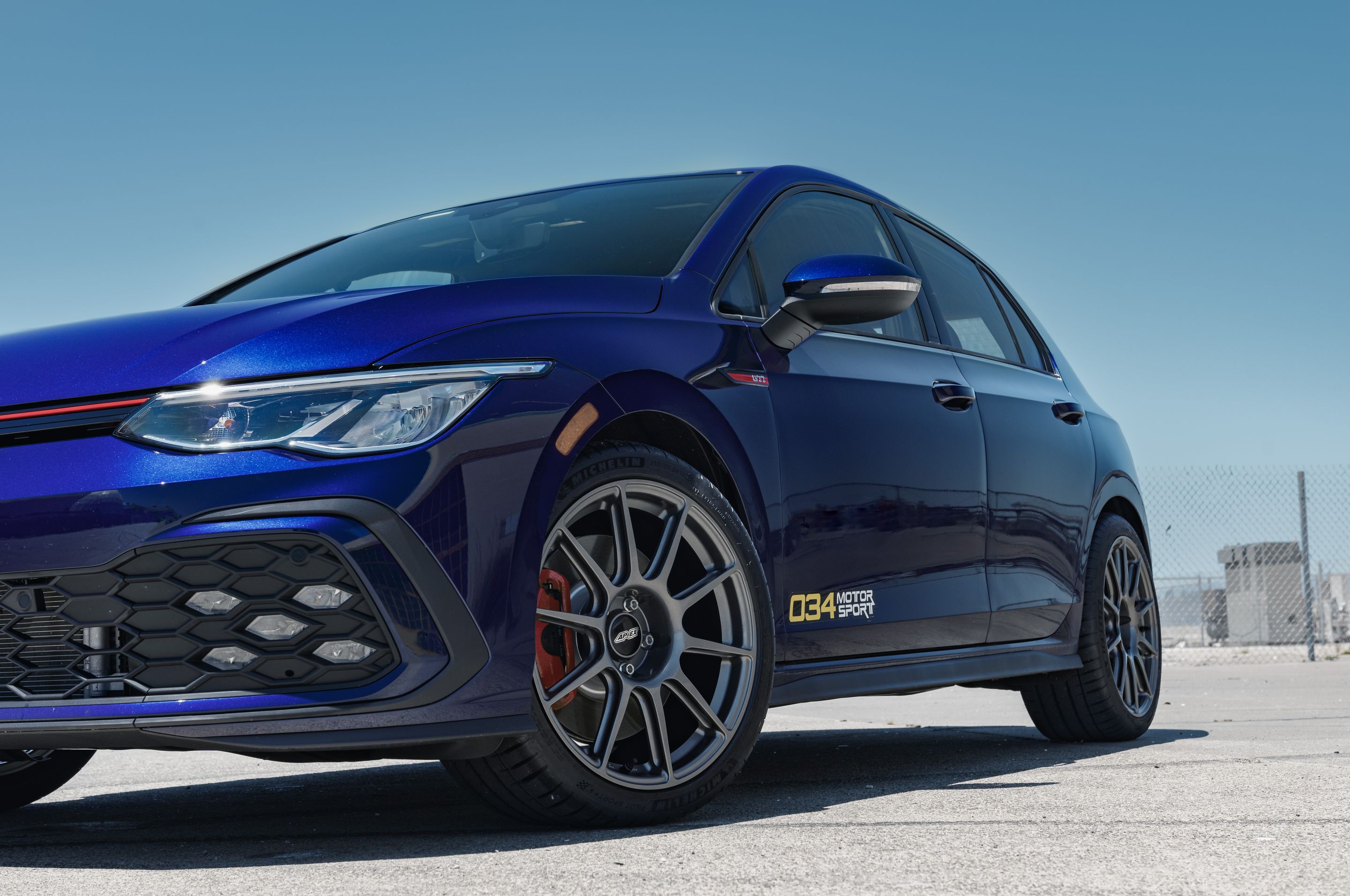 Blue VW MK8 GTI with 18" SM-10 Apex wheels in Anthracite