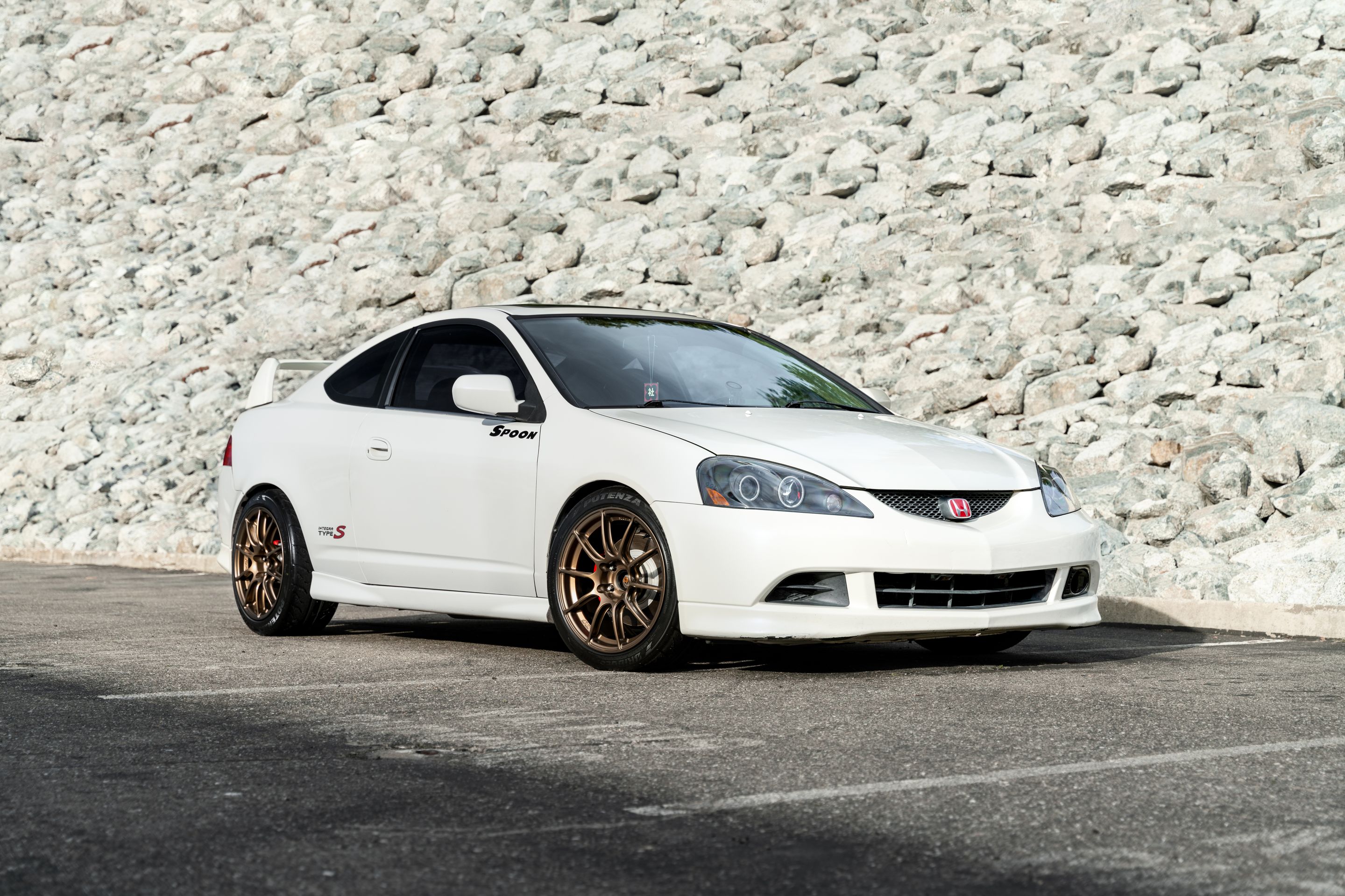 White Acura DC5 RSX with 17" SM-10RS Apex wheels in Satin Bronze