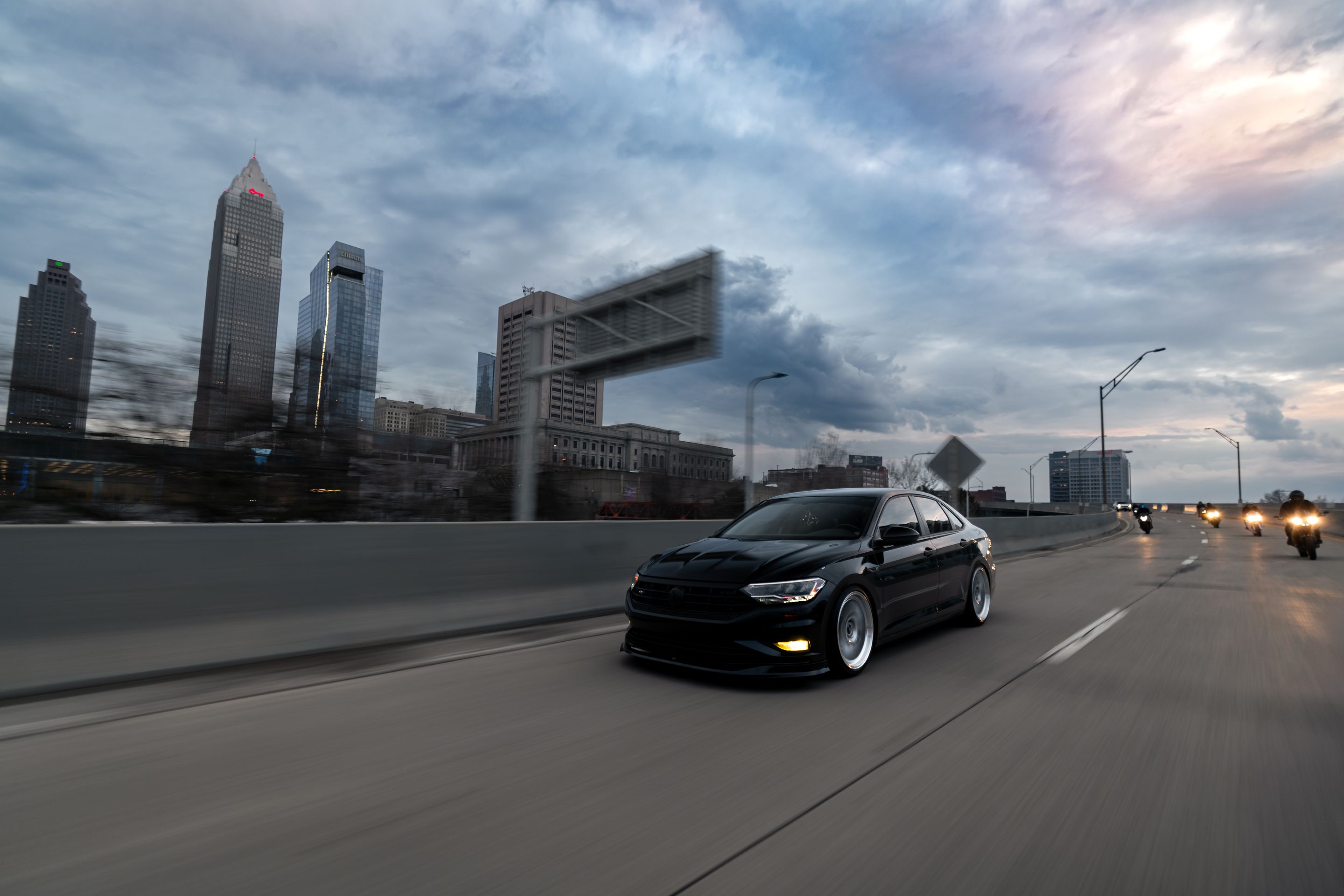 Black VW MK7 Jetta with 19" ML-10RT Apex wheels in Machined Lip Race Silver