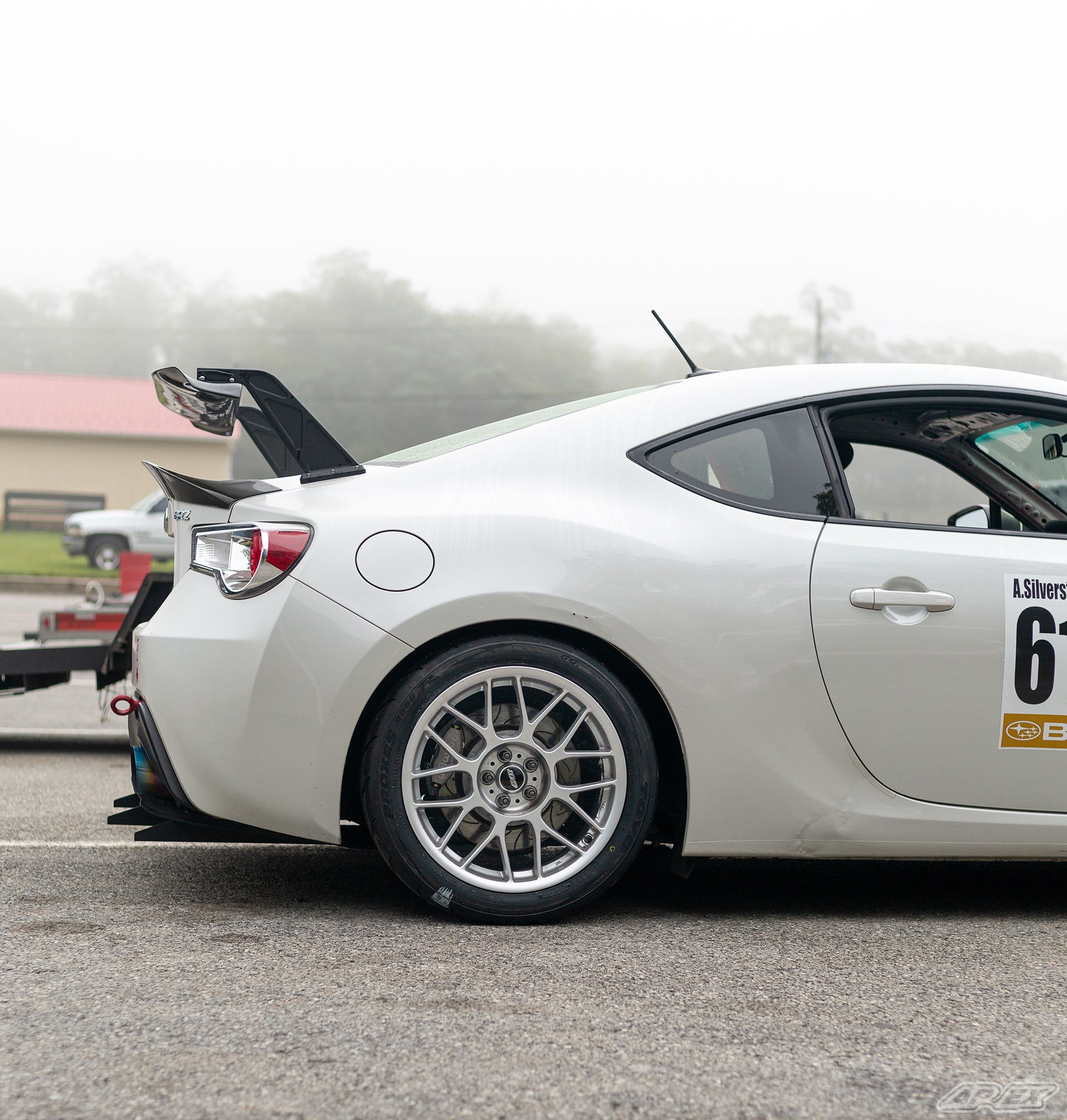 White Subaru ZC6 / Gen 1 BRZ with 17" ARC-8 Apex wheels in Race Silver