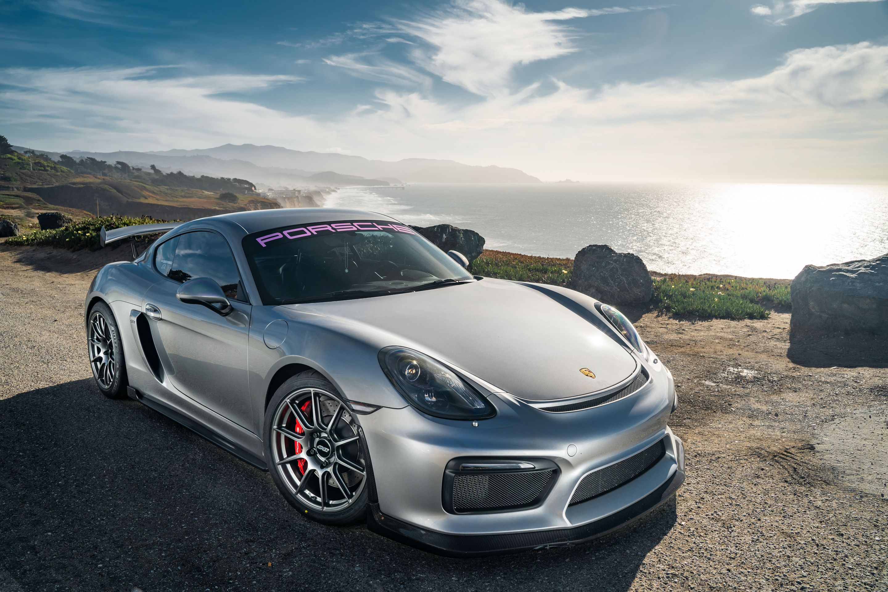 Silver Porsche 981 Cayman GT4 with 19" SM-10 Apex wheels in Anthracite