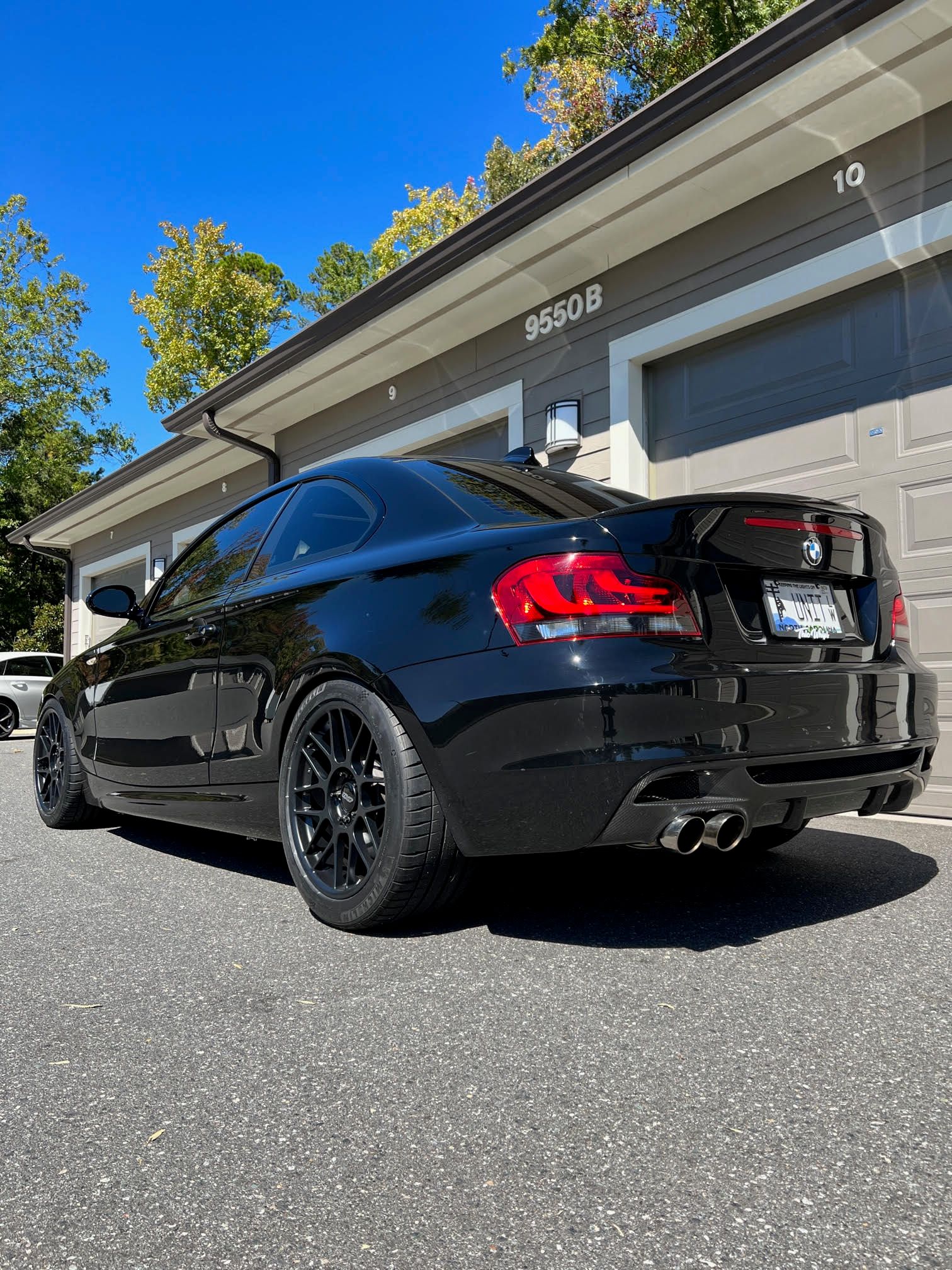 Black BMW E82 Coupe 1 Series with 18" ARC-8 Apex wheels in Satin Black