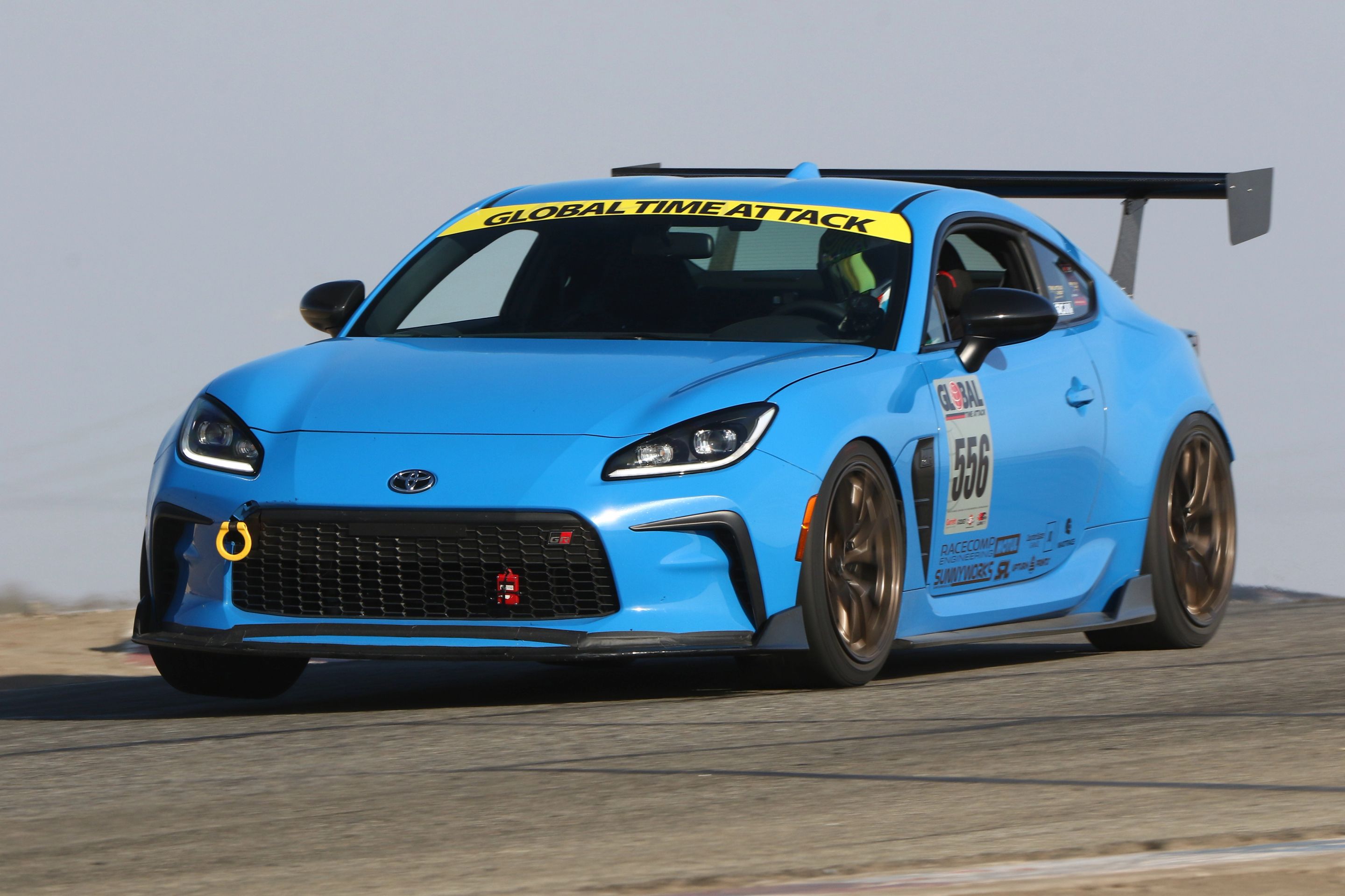 Blue Toyota GR86 with 18" VS-5RS Apex wheels in Satin Bronze