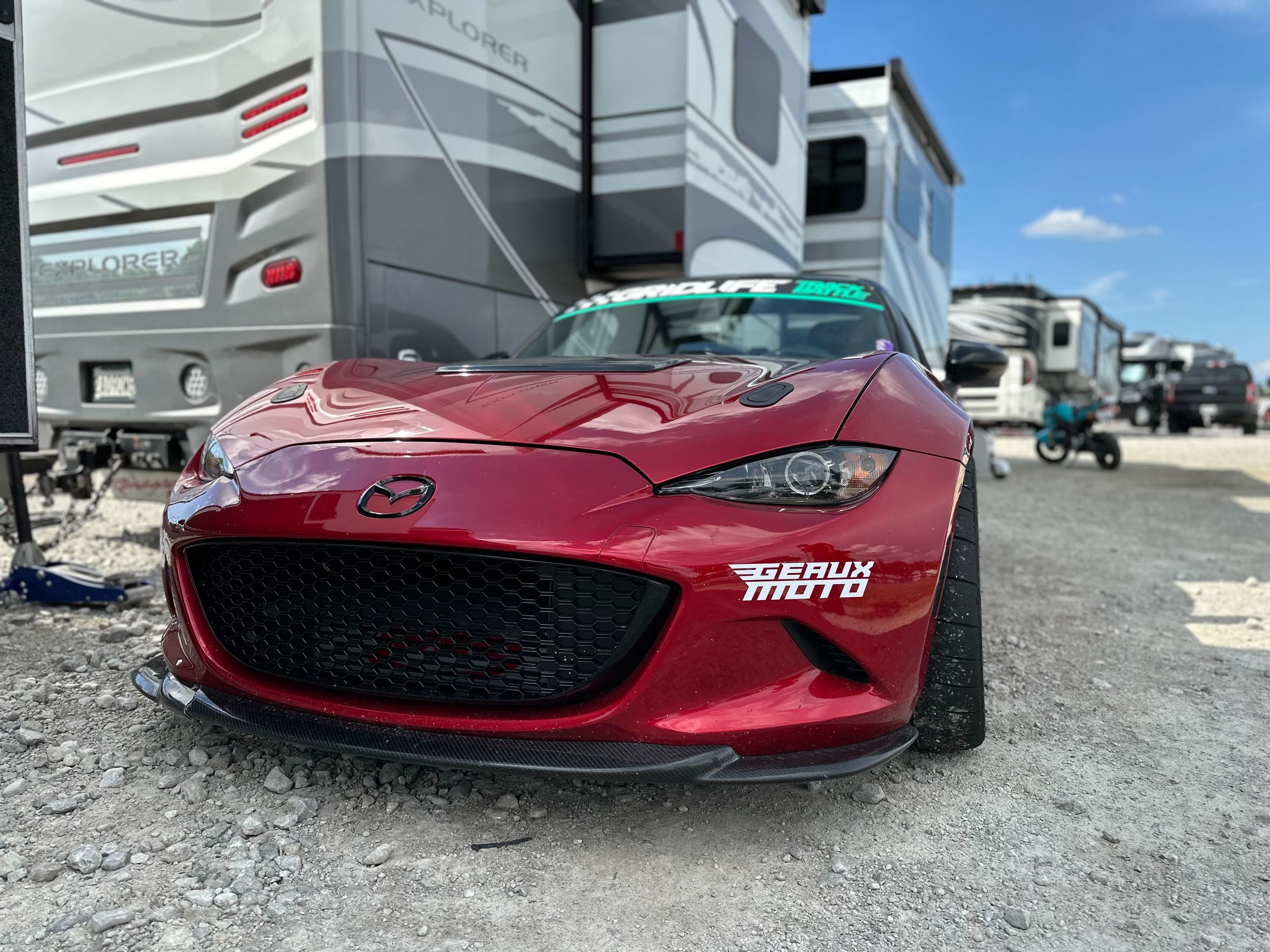 Red Mazda ND MX-5 Miata with 17" SM-8RS Apex wheels in Satin Bronze