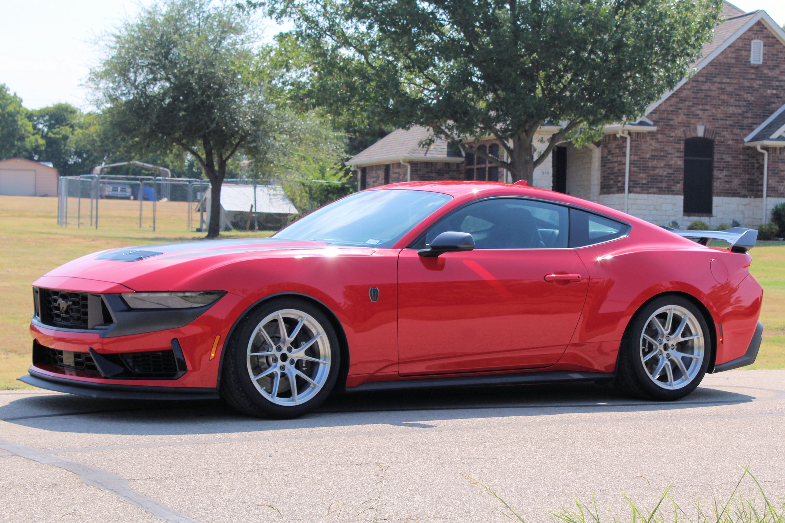 Red Ford S650 Mustang Dark Horse with 19" VS-5RS Apex wheels in Brushed Clear
