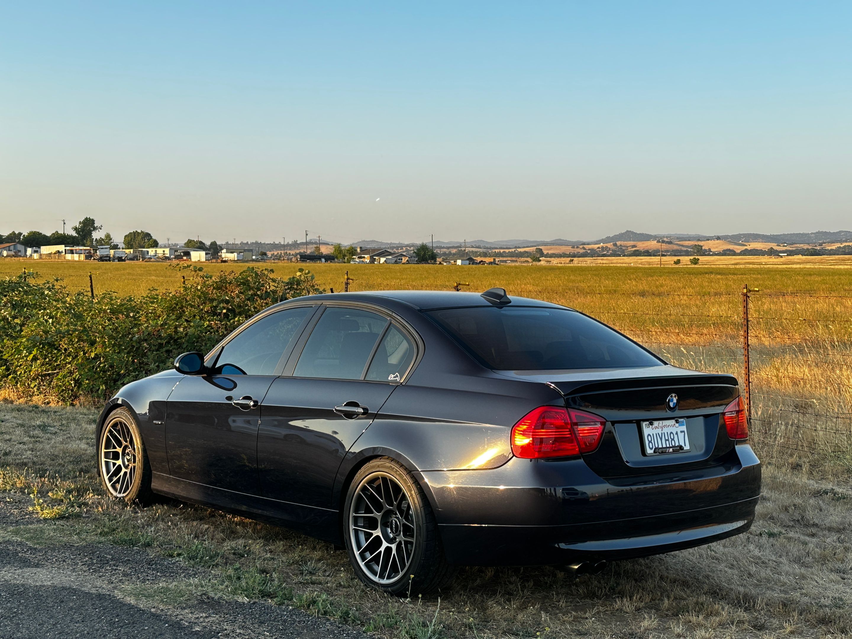 Black BMW E90 Sedan 3 Series with 18" ARC-8 Apex wheels in Anthracite